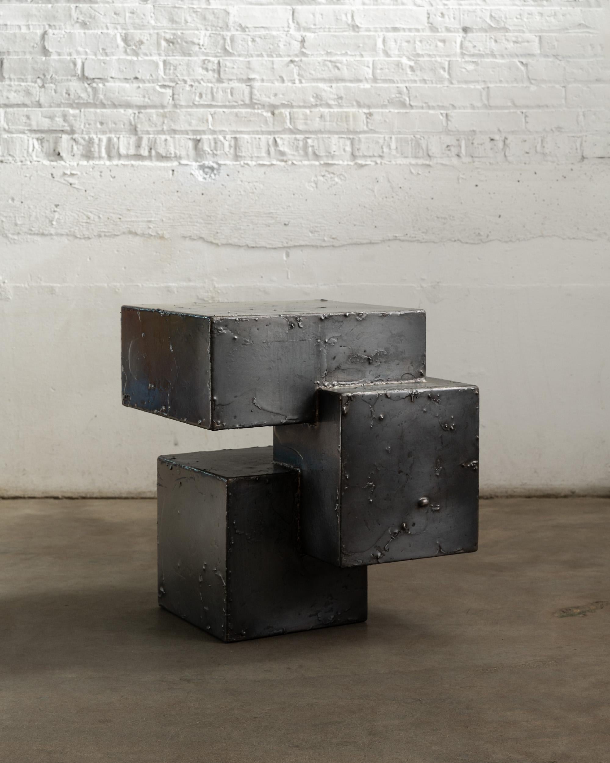 The Pewter Collection is a family of furniture pieces defined by their materiality and formal qualities. One Crucible at a time, pewter is melted into liquid form and hand coated onto the steel structure, creating the other-worldly surface that