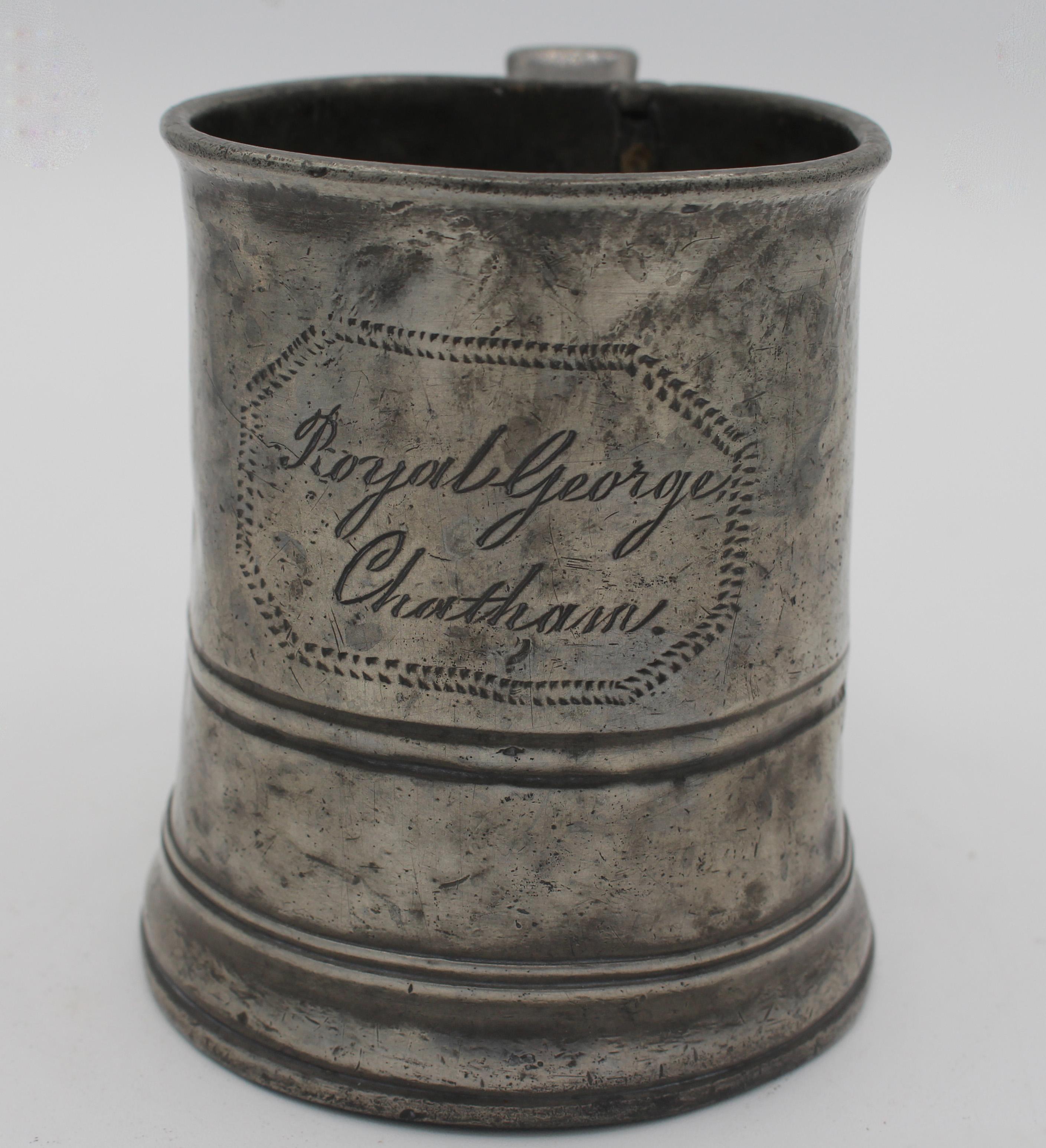 A pewter taper sided tankard from the Royal George Pub, Chatham. Pint size. Mark of a rearing horse in a shield, #6. Mid-19th century. Charles Dickens' country home Gad's Hill Place, was near Chatham and his happiest youthful days were in Chatham,