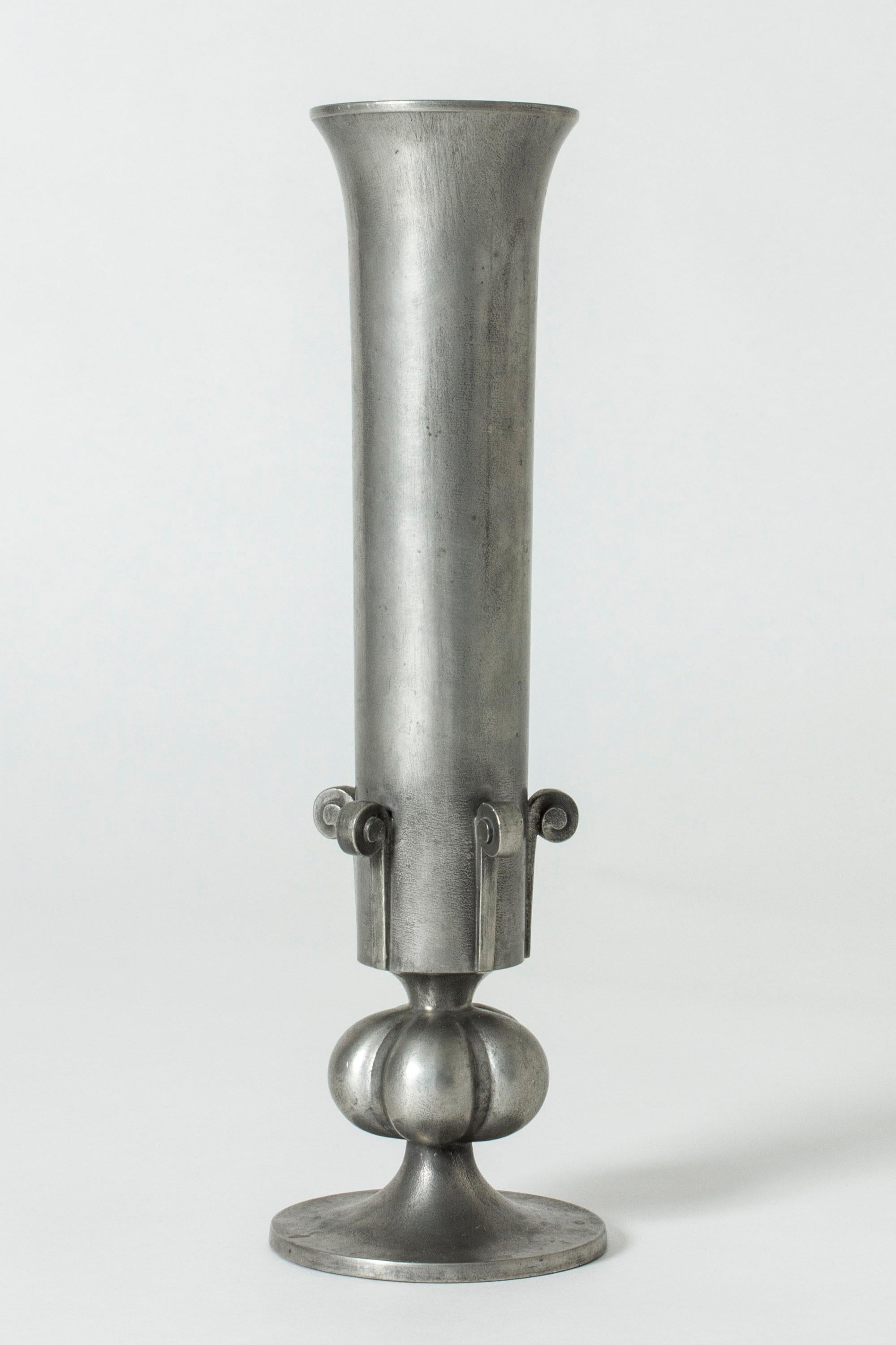 Tall pewter vase by Edvin Ollers, in a striking, statuesque design. Clean lines and beautiful decorative details.