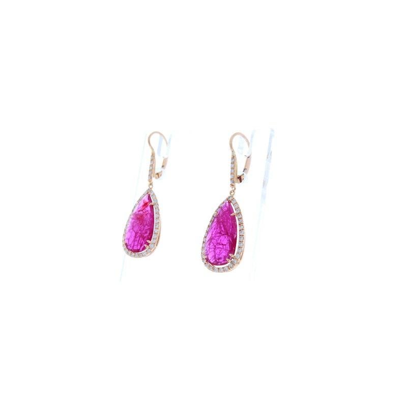 If you want unique ruby earrings, look no further. These beautiful earrings feature 8.59 carats of PGS certified, non-heated, pear shaped rubies and the color is out of this world! Unheated rubies are a huge deal. They are extremely rare. As if