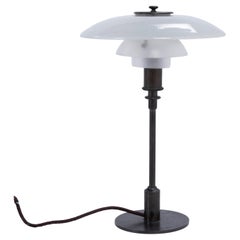 PH 3/2 - Table lamp in patinated browned brass by Poul Henningsen