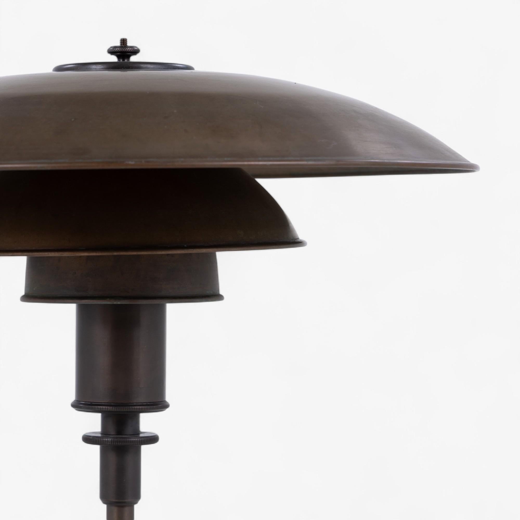 PH 4/3 - Table lamp with patinated copper shades. Stamped “PATENTED”.
