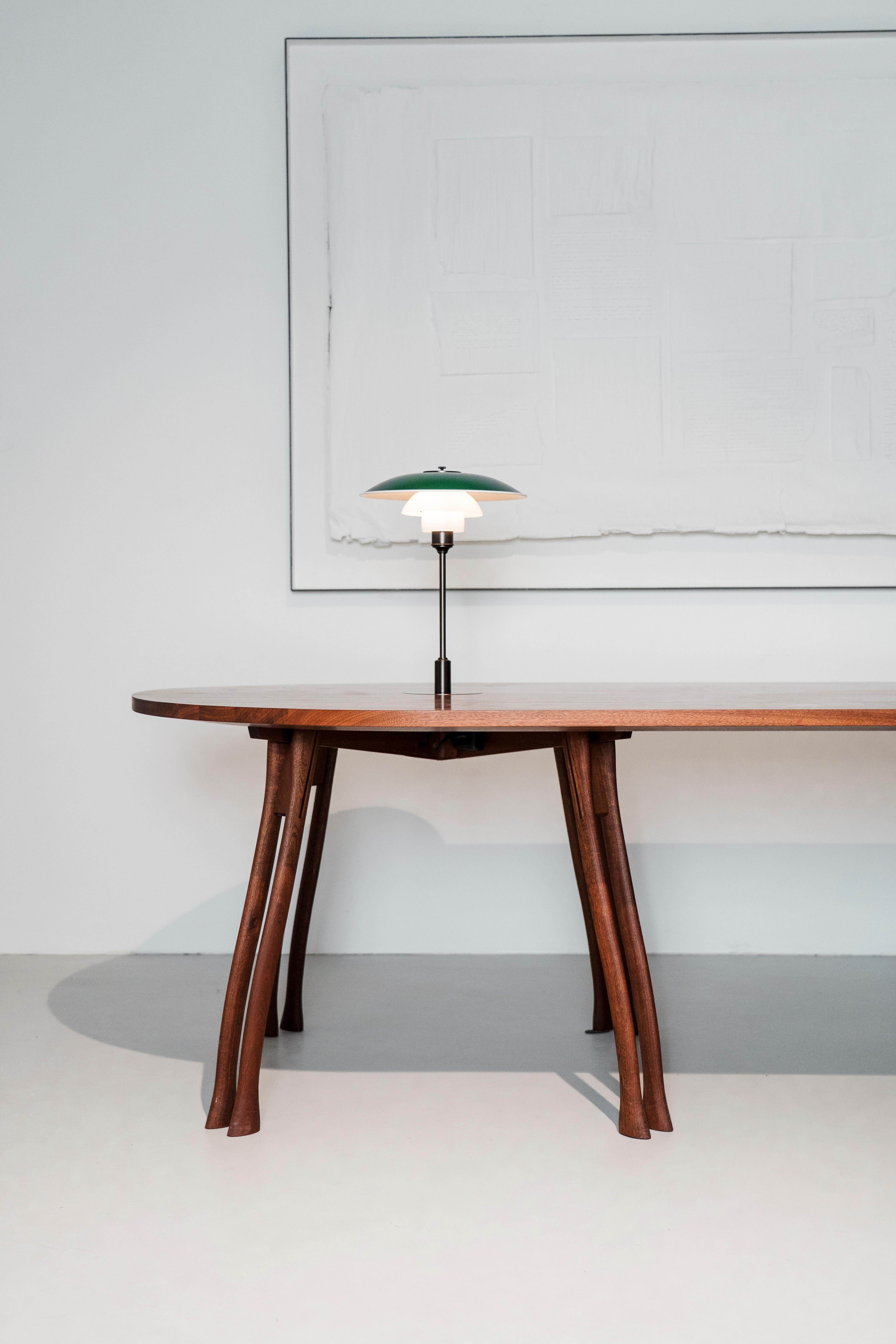 Bauhaus PH Board Table - mahogany legs and table plate with two green PH 3 ½ - 2 ½ lamps For Sale