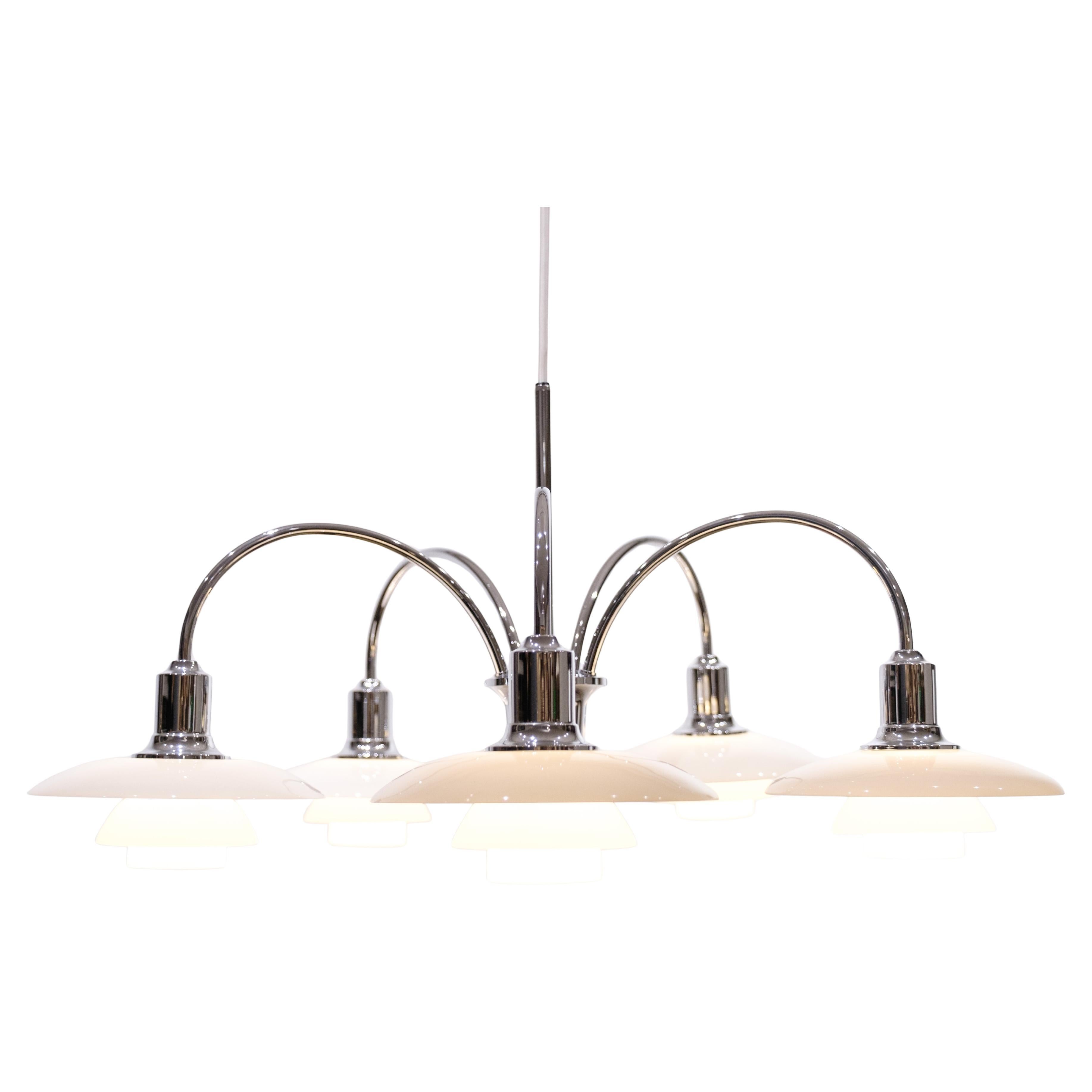 Beautiful ceiling lamp that fits well above the dining table or in a living room. Designed by Poul Henningsen (1894-1967) and produced by Louis Poulsen for a very limited period on the occasion of their 125th Anniversary. The well-designed ceiling