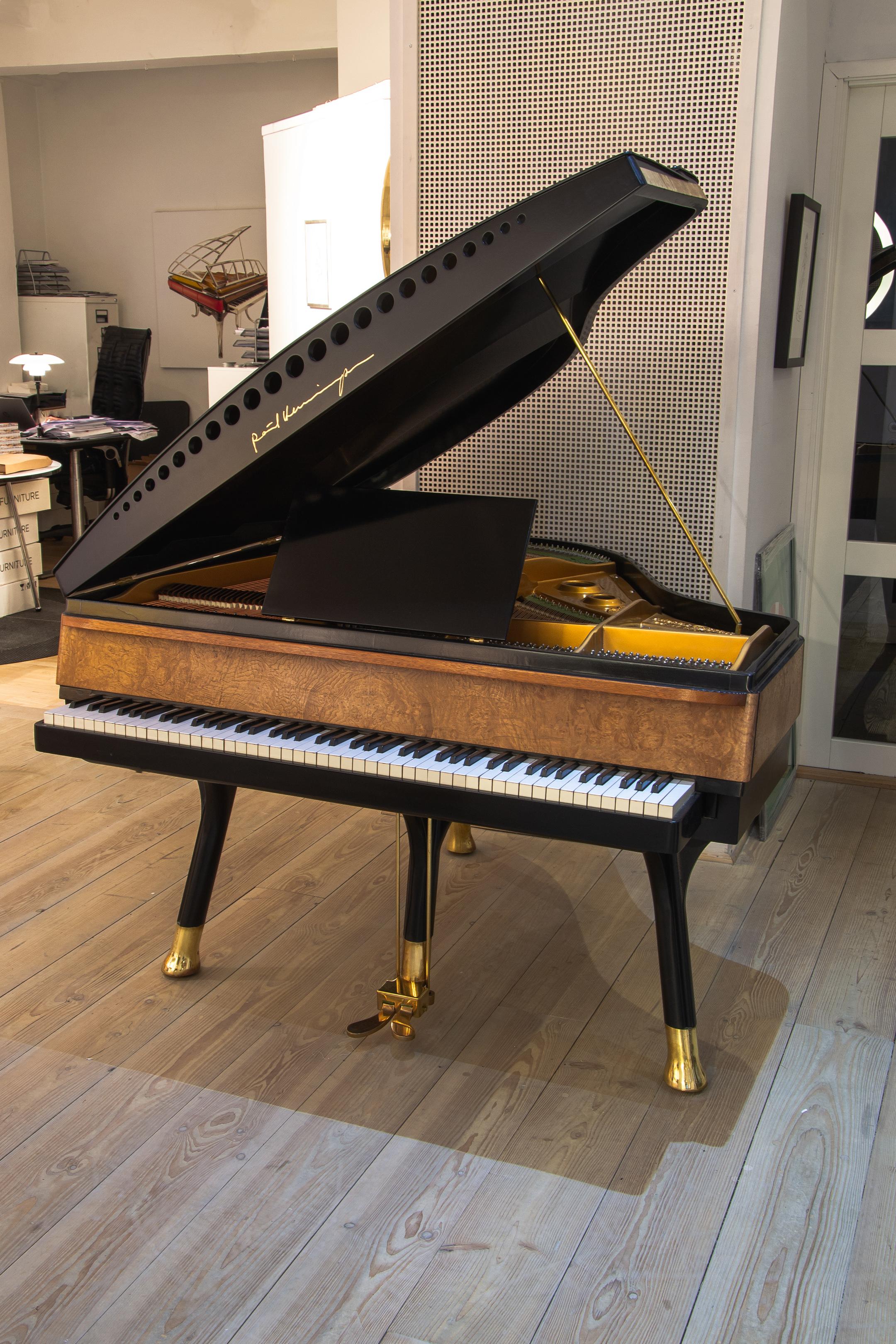 - All prices are listed ex works.
- 5 year guarantee.
- We regularly crate, ship and install PH Pianos worldwide with full insurance.

This beautiful PH Bow Grand Piano is made with a new cabinet in a very elegant chestnut veneer and with a