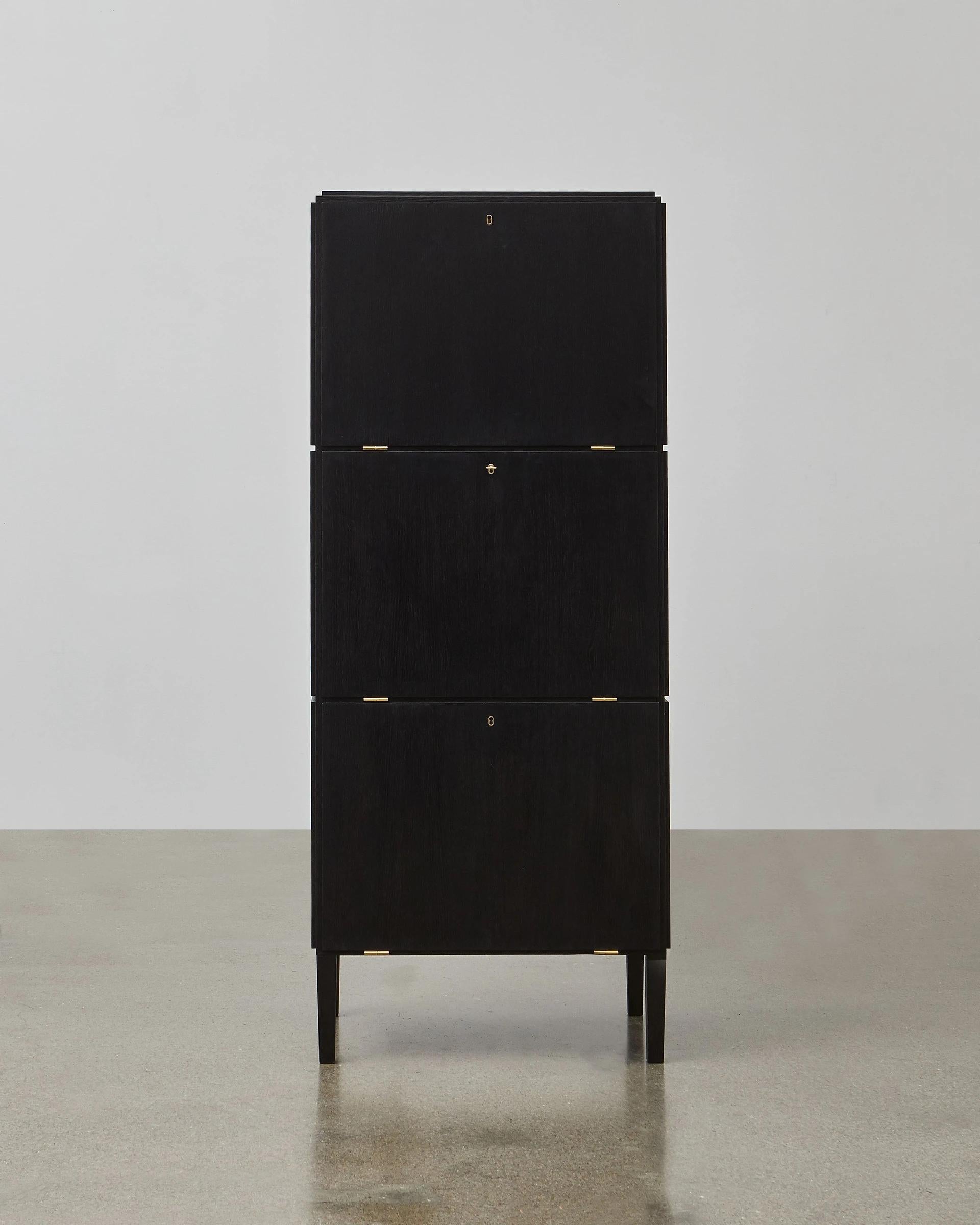 Constructed of clean lines in luxurious wood, the PH cabinet is the perfect place to display precious mementoes. The PH cabinet also features a highly practical element of three concealed storage compartments.

As with all PH Furniture, the PH