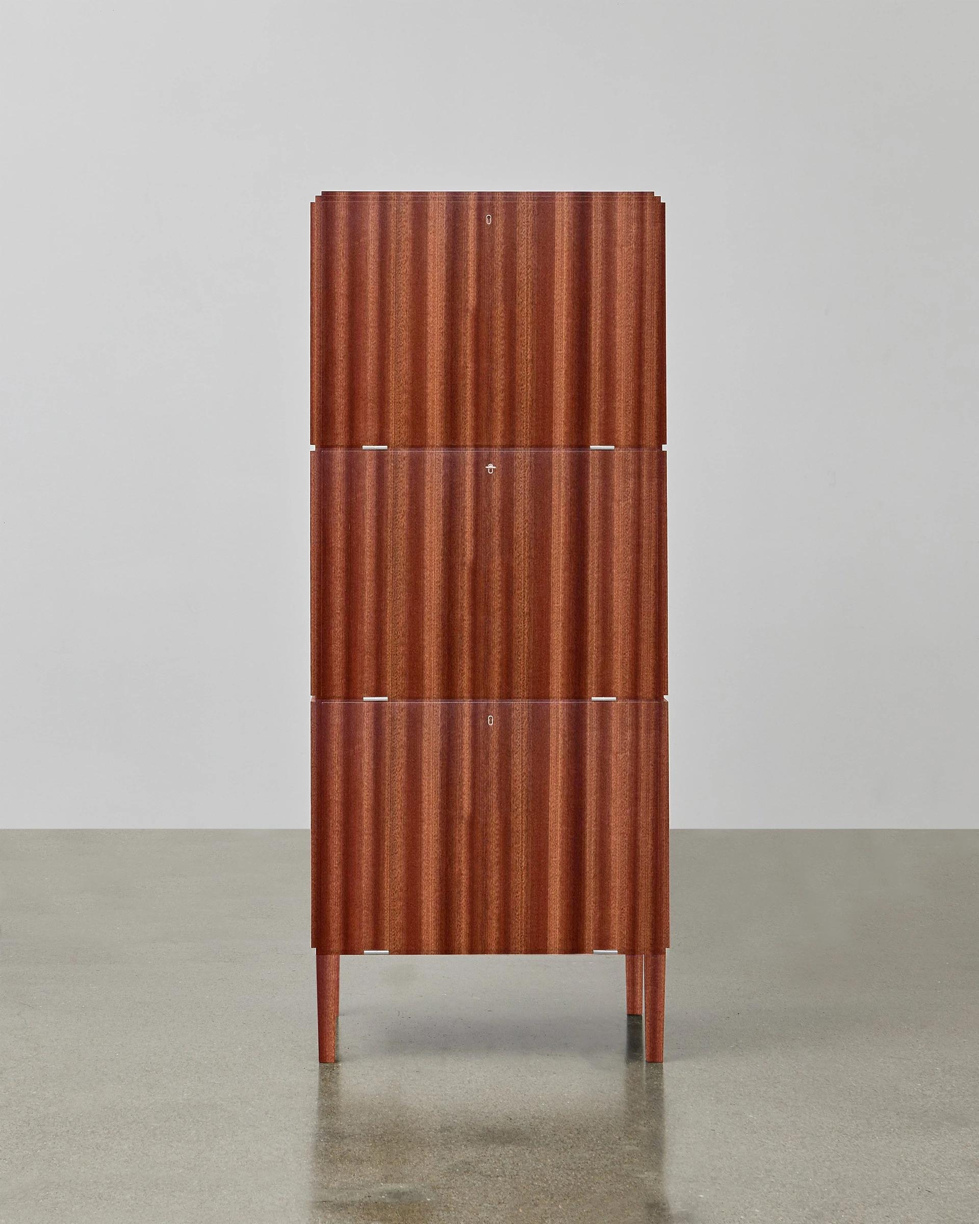 Constructed of clean lines in luxurious wood, the PH cabinet is the perfect place to display precious mementoes. The PH cabinet also features a highly practical element of three concealed storage compartments.

As with all PH Furniture, the PH