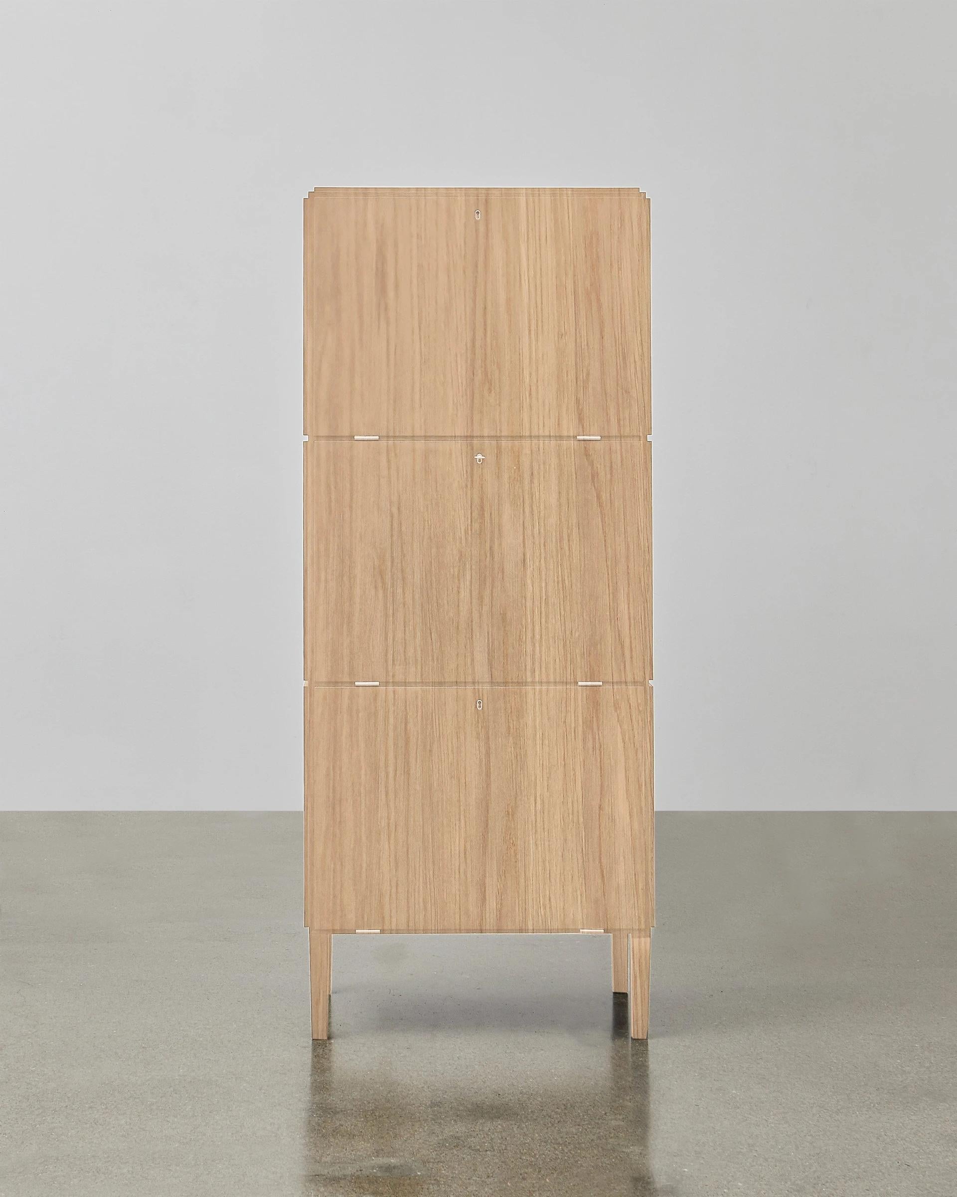 Constructed of clean lines in luxurious wood, the PH Cabinet is the perfect place to display precious mementoes. The PH Cabinet also features a highly practical element of three concealed storage compartments.

As with all PH Furniture, the PH