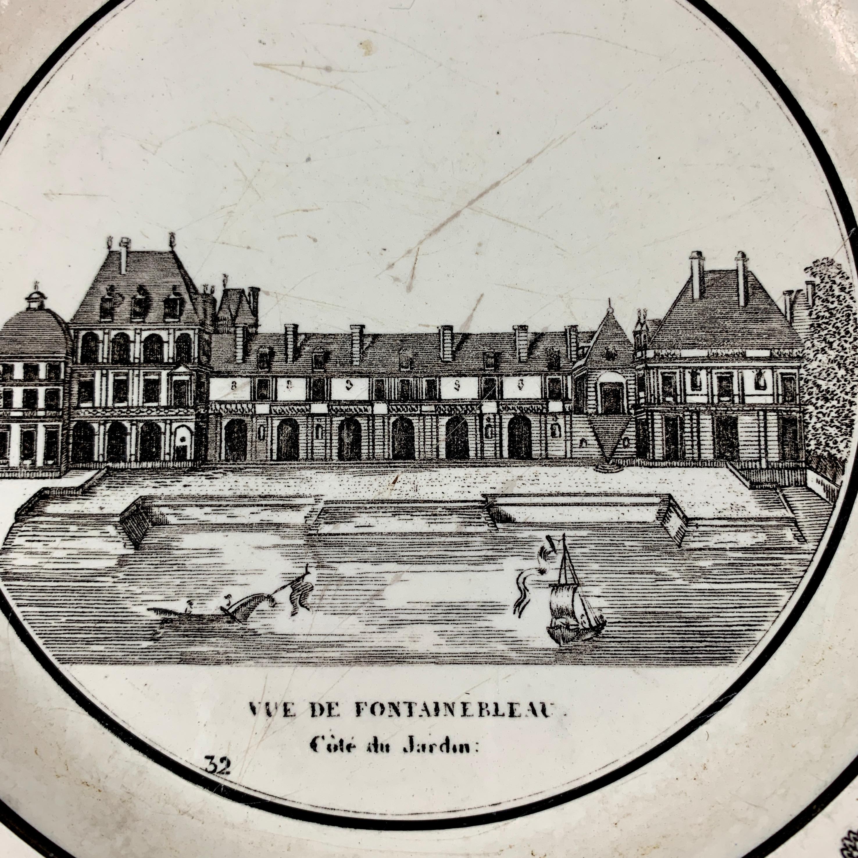 A French Neoclassical faïence transfer printed creamware plate produced by P&H Choisy, circa 1824-1836.

A black transfer of an architectural image on a creamware body, depicting the Vue de Fontainbleu à Paris. The building is prominent, with the