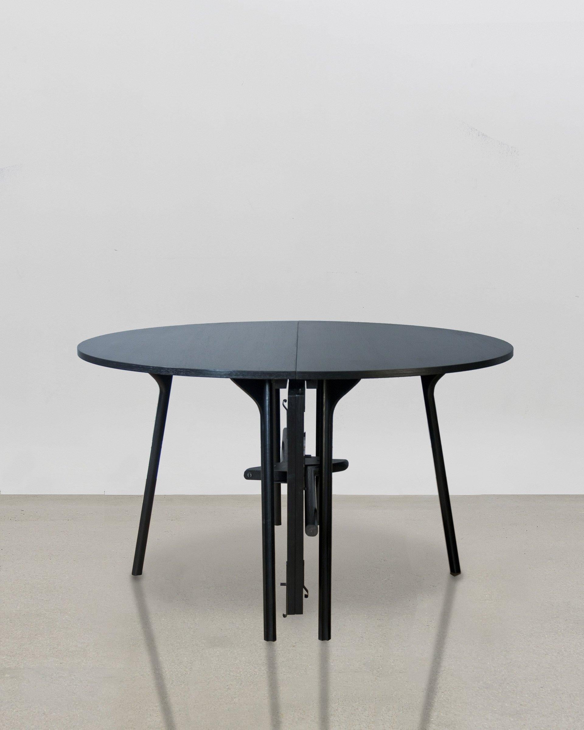 The intricately shaped legs of the PH Circle Table – inspired by the agile movement of the scarab beetle, together with the benefit of precision design and engineering – enable Poul Henningsen to design a table with the most unobtrusive of