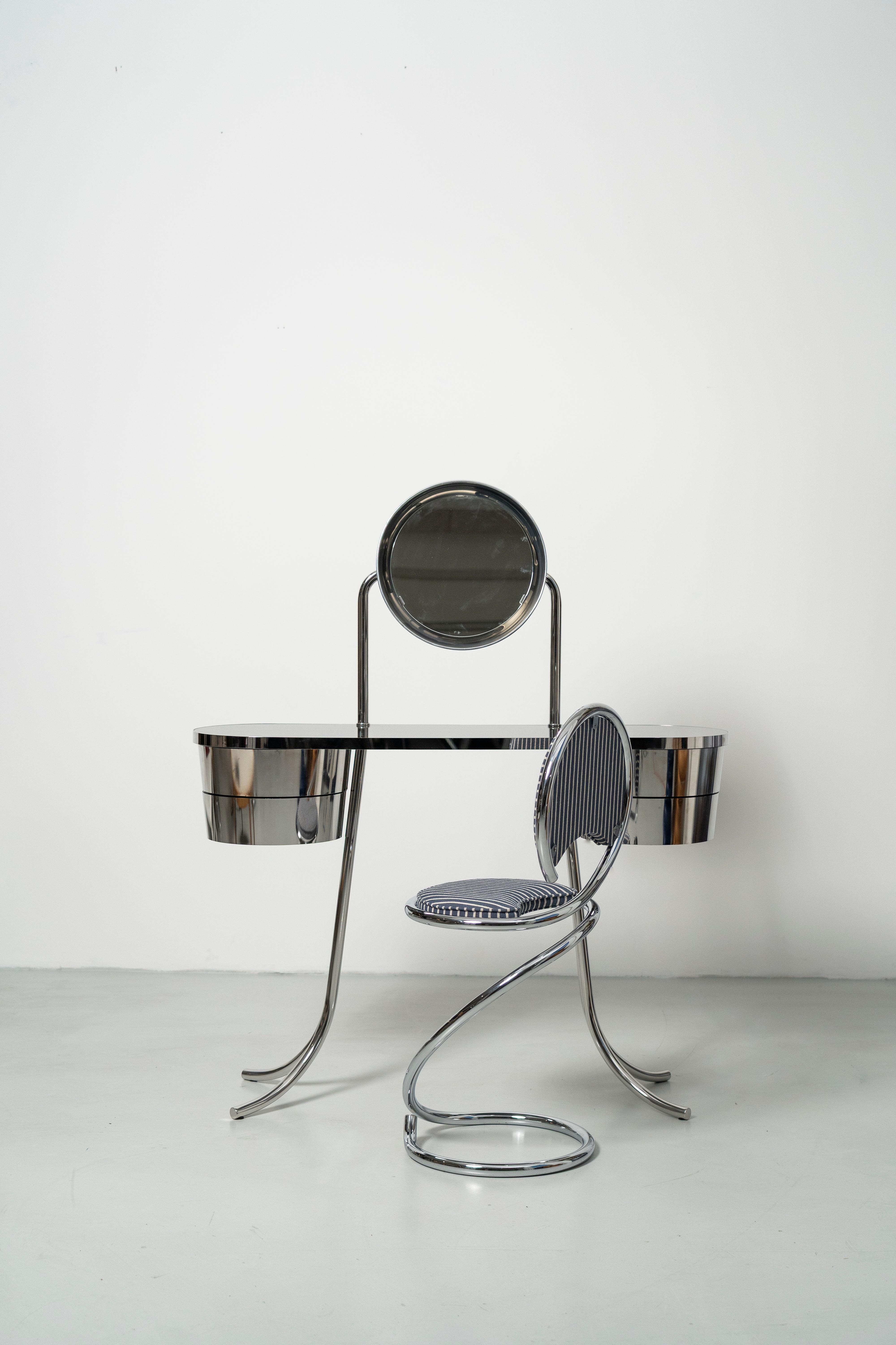 The PH Dressing Table Steel with the PH Mirror reinterprets Poul Henningsen’s 1919 dressing table for a contemporary, steel framed expression. Light in presence yet strong in construction, the piece preserves PH’s original idea of clarity between
