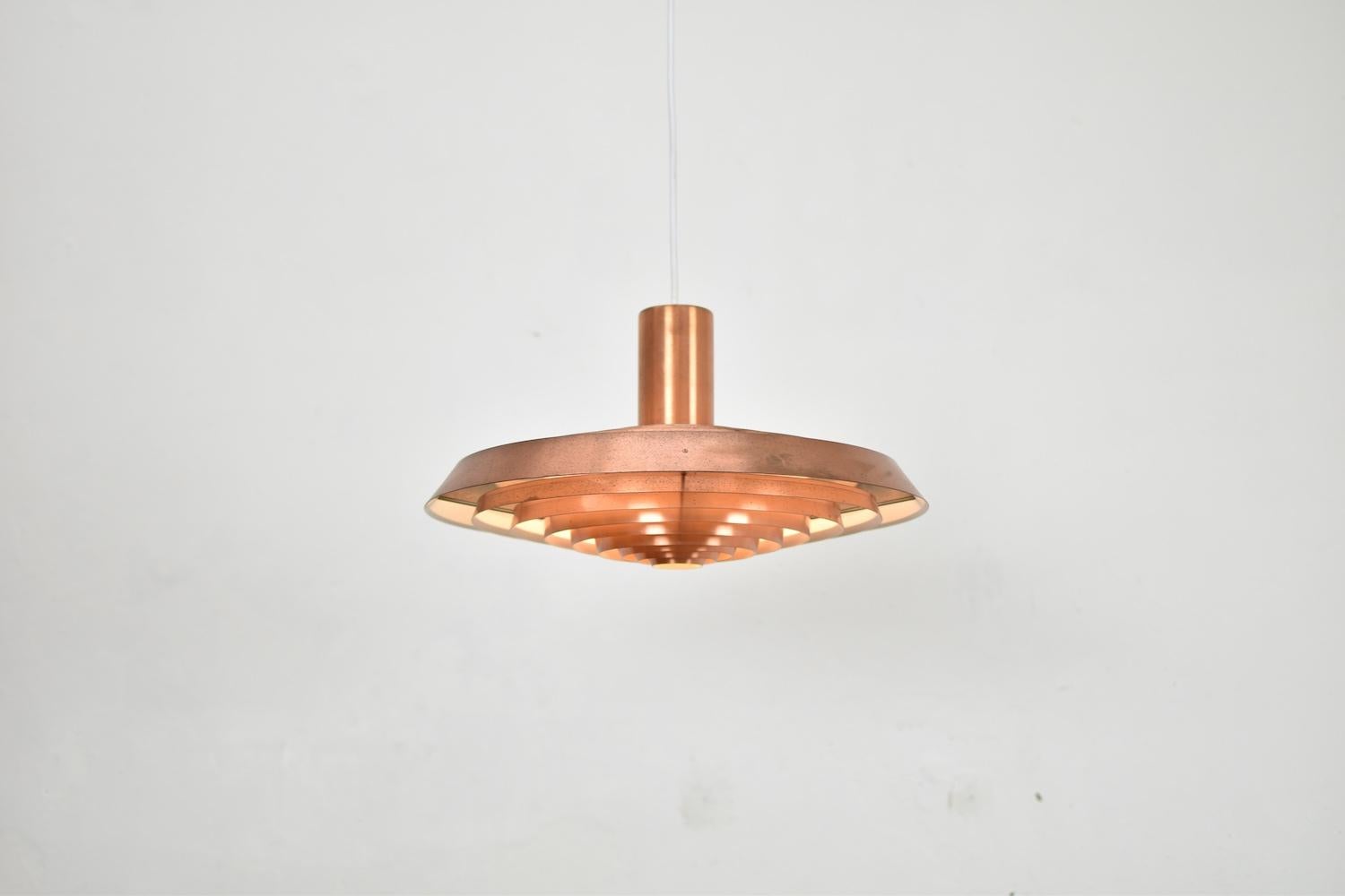 Proud to present you this rare PH Langelinie pendant by Poul Henningsen for Louis Poulsen, Denmark, 1950s. This pendant is made out of solid brass and was designed for the Langelinie Pavillion in Copenhagen. The design of this lamp was inspired by