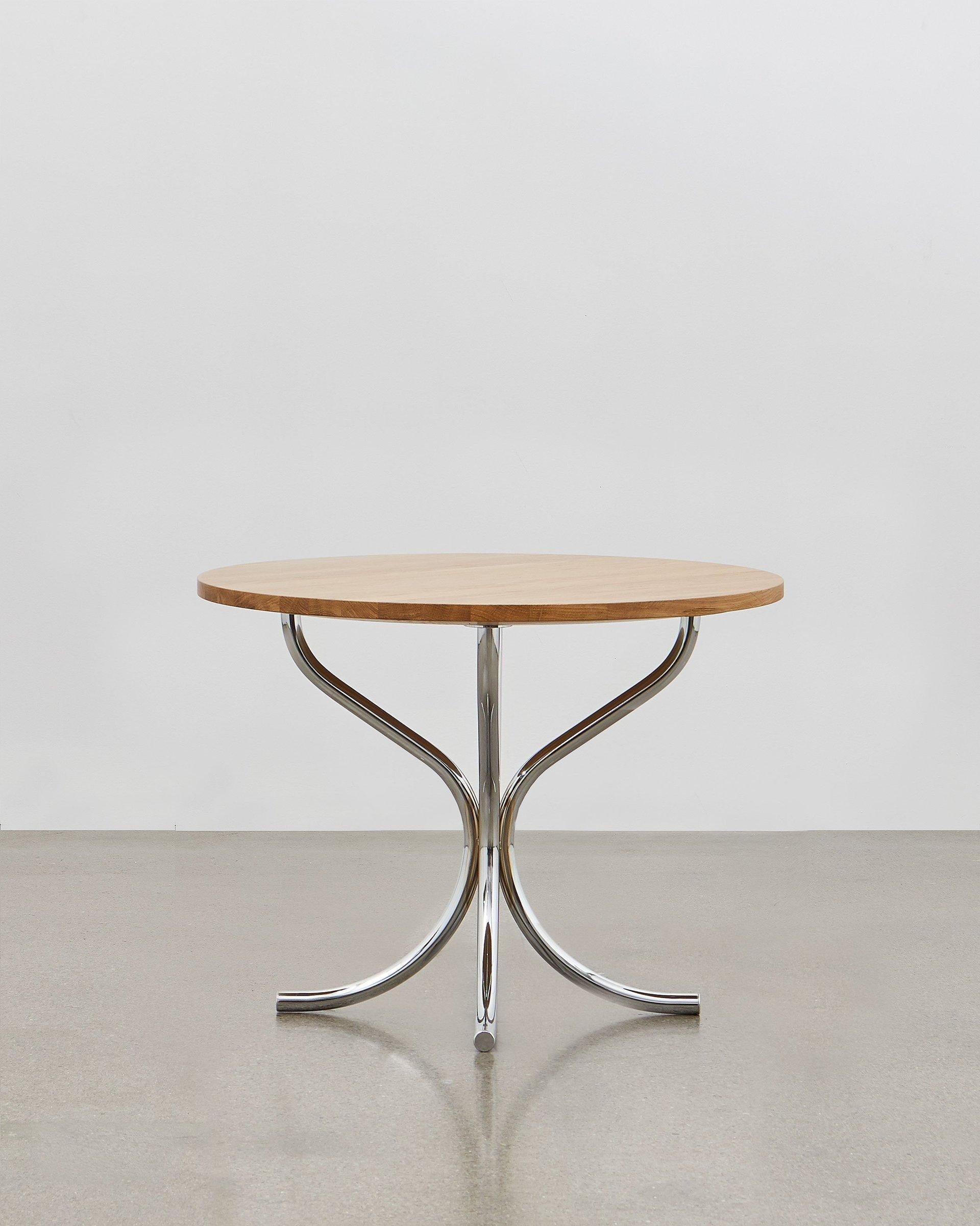 The PH lounge table designed by Poul Henningsen is the perfect addition to any lounge space where a table is required to gather around or for display. Taller than a low coffee table, the PH lounge table lends itself to a wide variety of settings,