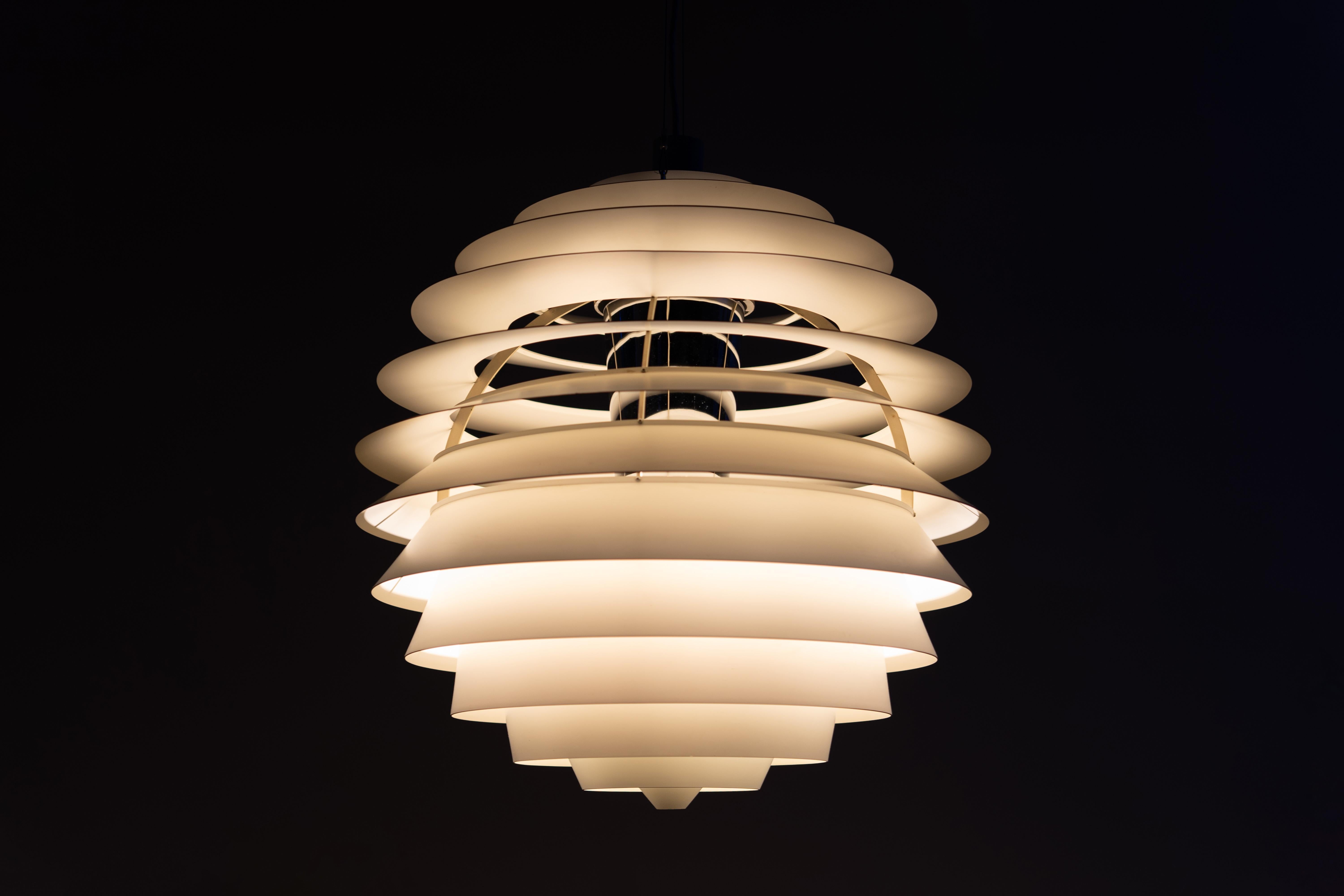 PH Louvre Pendant - Louis Poulsen
Design by Poul Henningsen, 1957

This iconic PH Louvre pendant lamp, designed by Poul Henningsen in 1957 for Louis Poulsen, is a timeless masterpiece of Danish modernism. With its elegant, multi-shade design, the