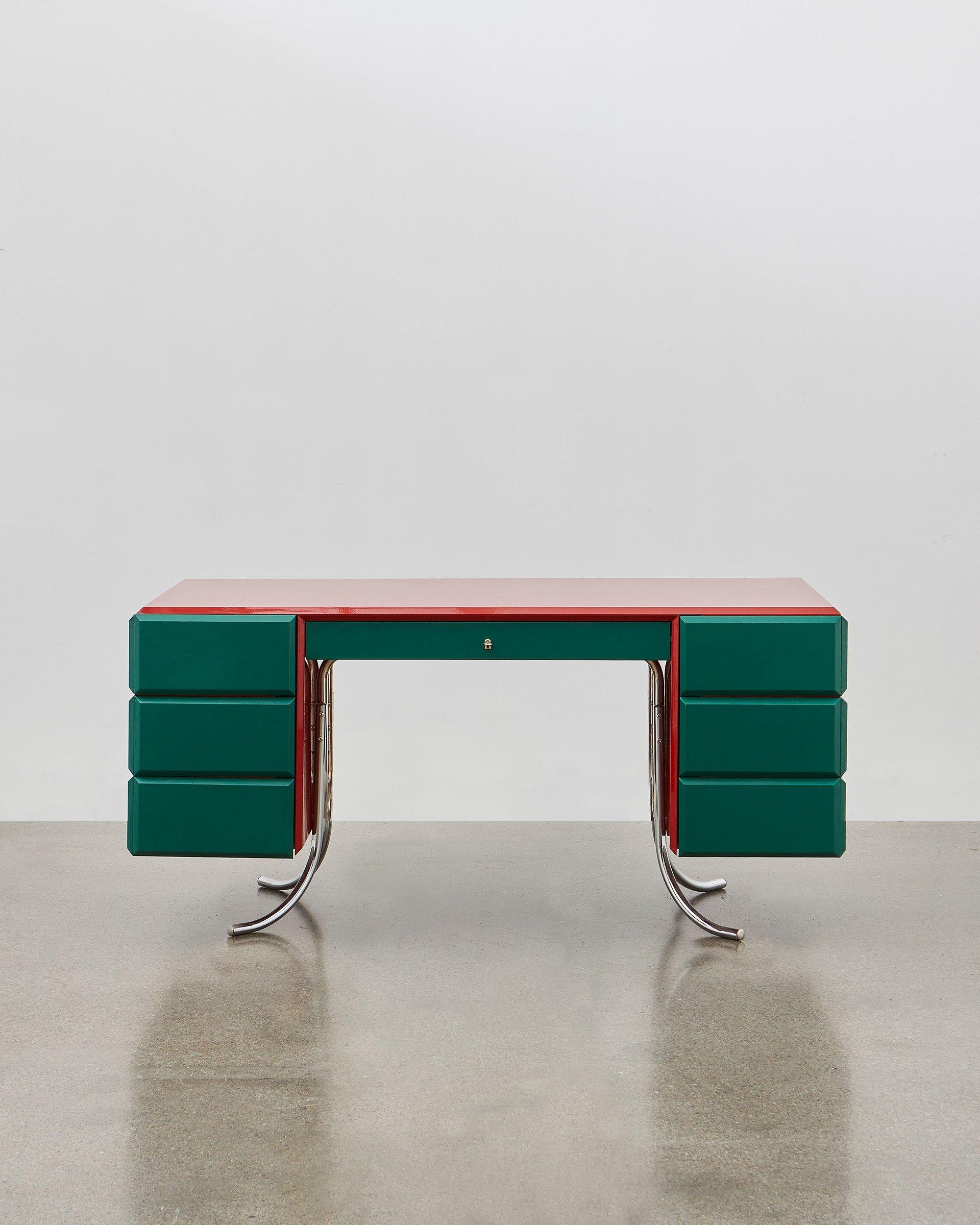 Bold and colorful, this desk will add style and character too your working day. Poul Henningsen designed this masterpiece in 1935. A harmony of striking aesthetics and practicality, PH’s design features a desktop painted in high gloss, six swing