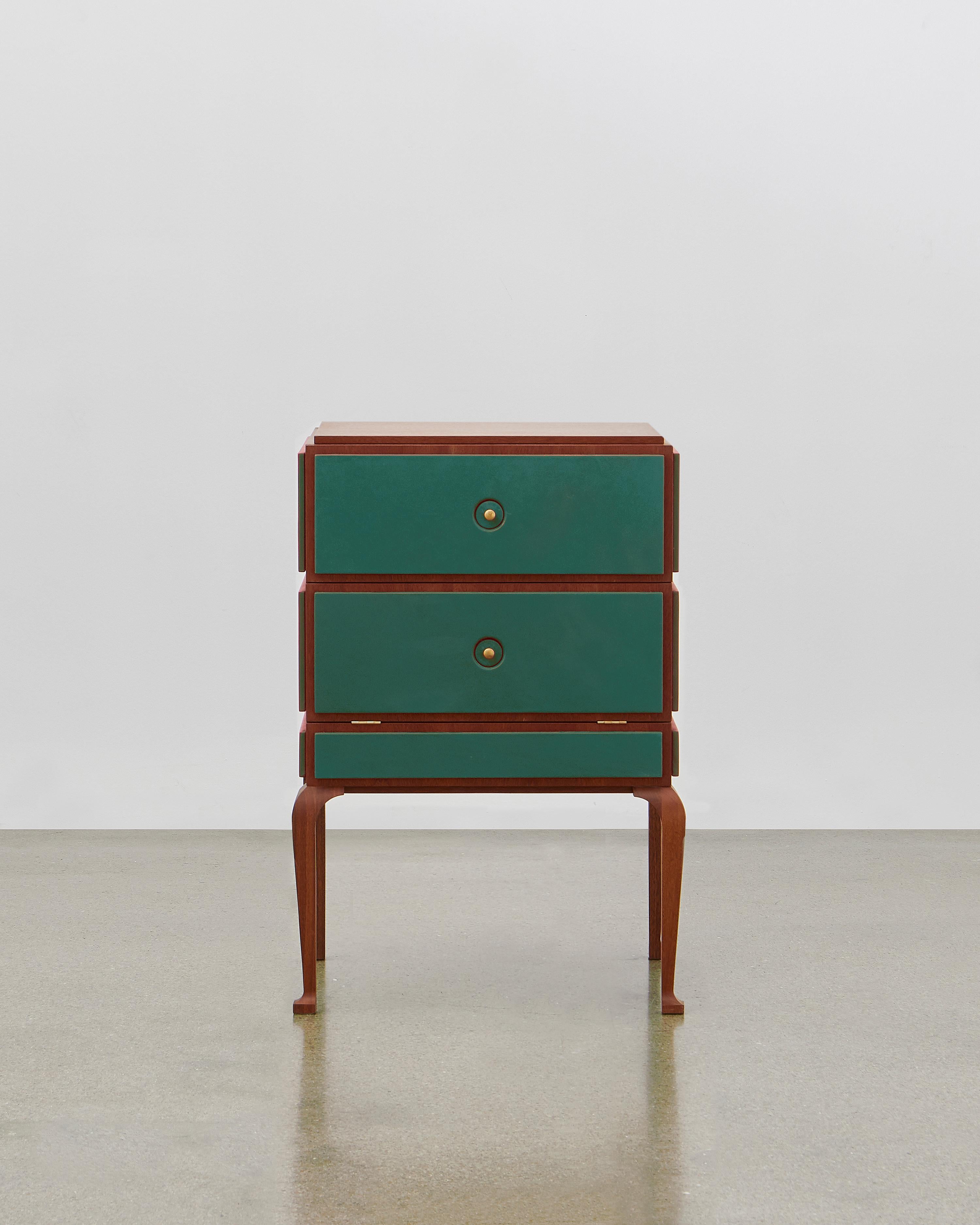 This small but perfectly formed storage piece is made out of wood and can be combined with soft leather on the panels. 

It is elegant and stylish all the way around and from all angles. Poul Henningsen designed this in 1920.

The PH small