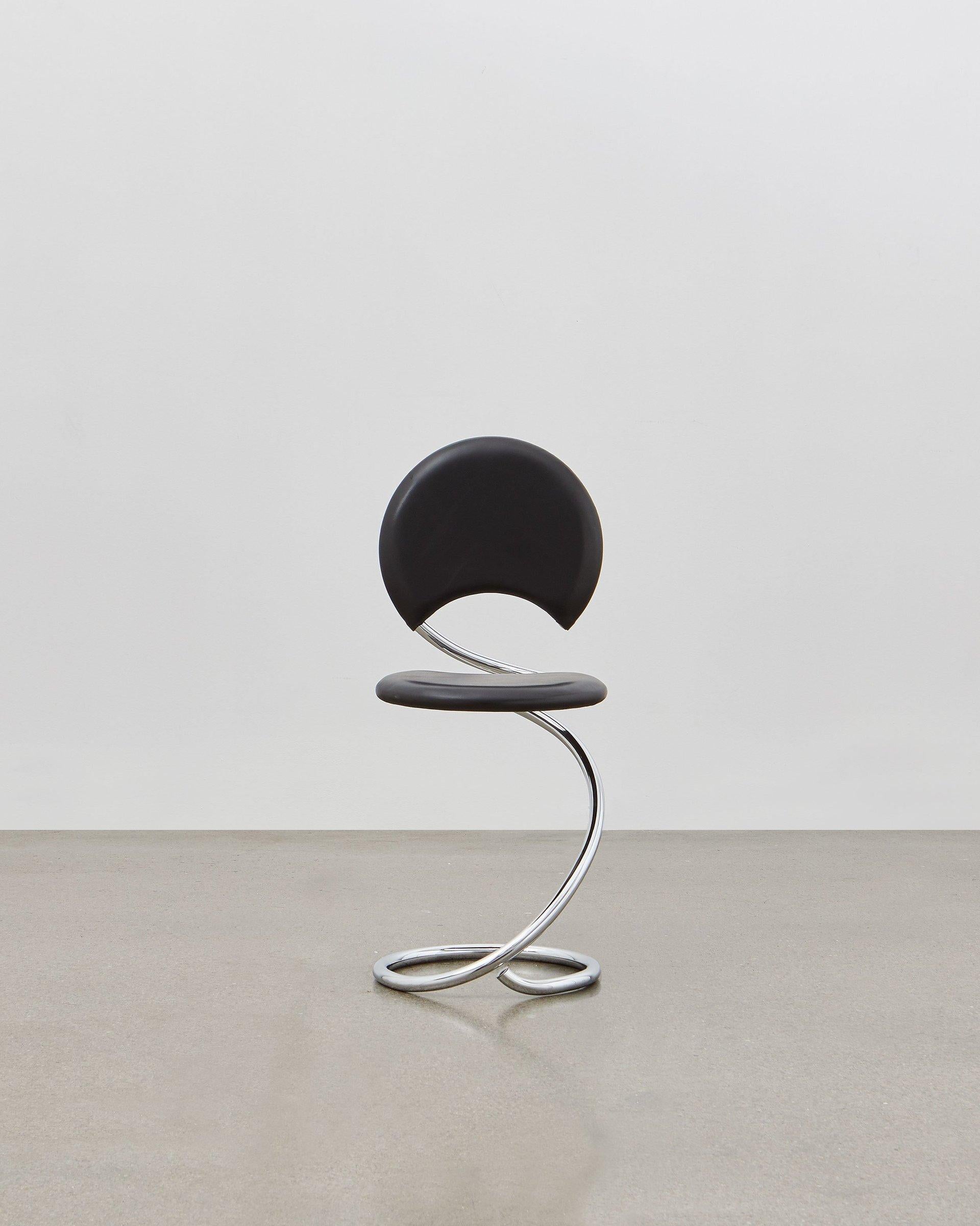 The PH snake chairs flowing lines within its steel tube design are inspired by the strong yet flexible body of a snake. It is multi-use and fits any room at home, in the apartment, in the office, with a function or simply as a piece of art to be