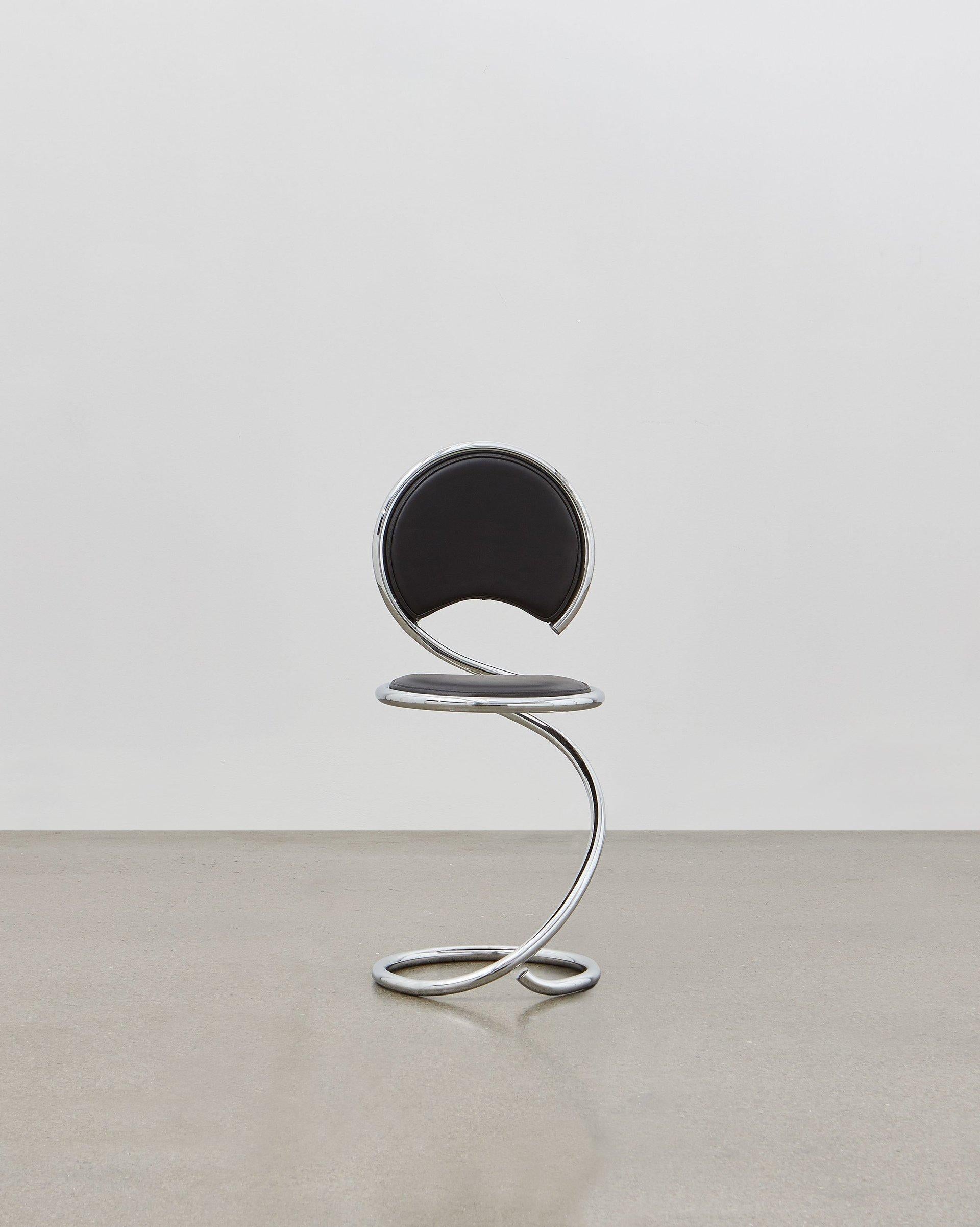 The PH Snake Chairs flowing lines within its steel tube design are inspired by the strong yet flexible body of a snake. It is multi-use and fits any room at home, in the apartment, in the office, with a function or simply as a piece of art to be