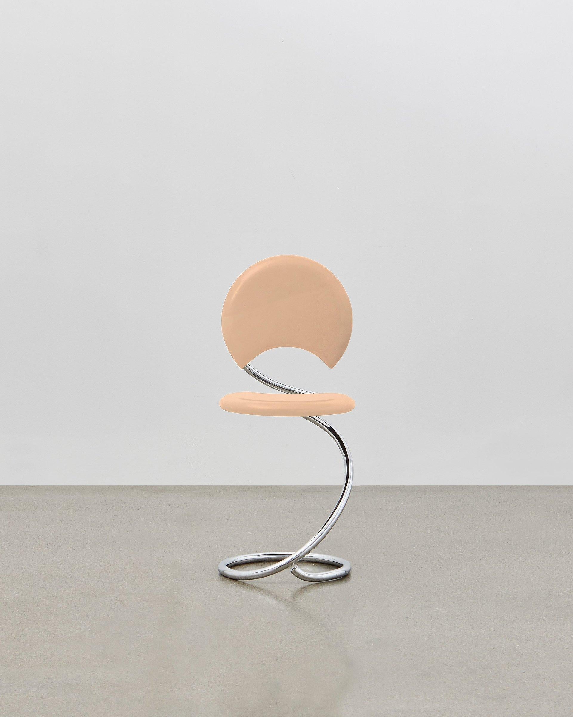 The PH snake chairs flowing lines within its steel tube design are inspired by the strong yet flexible body of a snake. It is multi-use and fits any room at home, in the apartment, in the office, with a function or simply as a piece of art to be