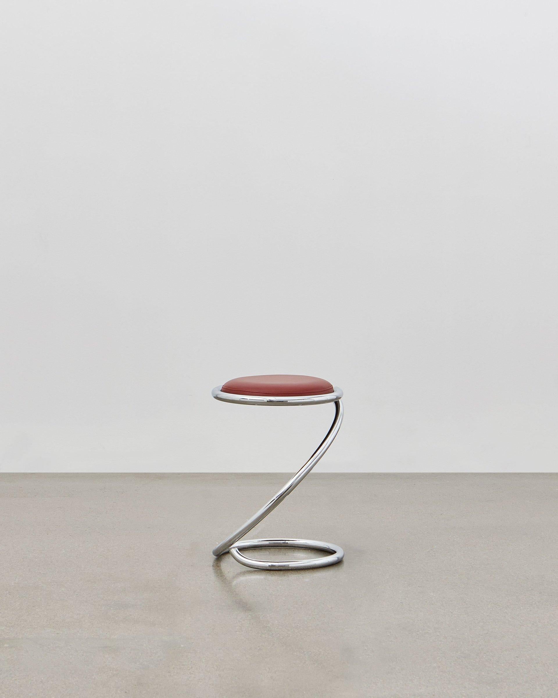 The PH Snake Stool is completely true to the original design and the use of chromed steel tubes, however updated for the 21st century to be available with wood seating in five colorways to coordinate with the ever-popular Poul Henningsen lighting