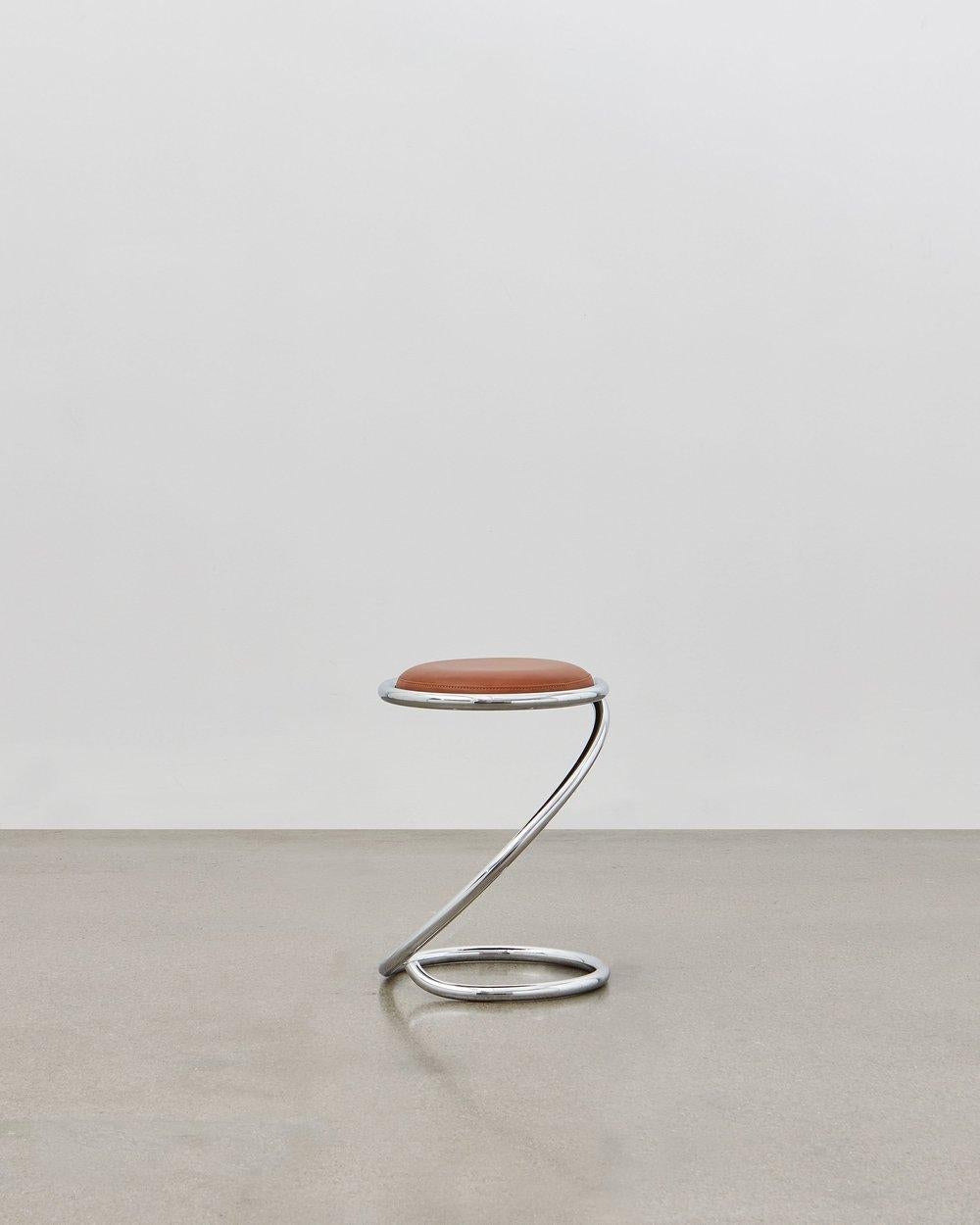 The PH Snake stool is completely true to the original design and the use of chromed steel tubes, however updated for the 21st century to be available with wood seating in five colorways to coordinate with the ever-popular Poul Henningsen lighting