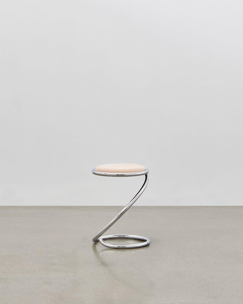 The PH Snake stool is completely true to the original design and the use of chromed steel tubes, however updated for the 21st century to be available with wood seating in five colorways to coordinate with the ever-popular Poul Henningsen lighting