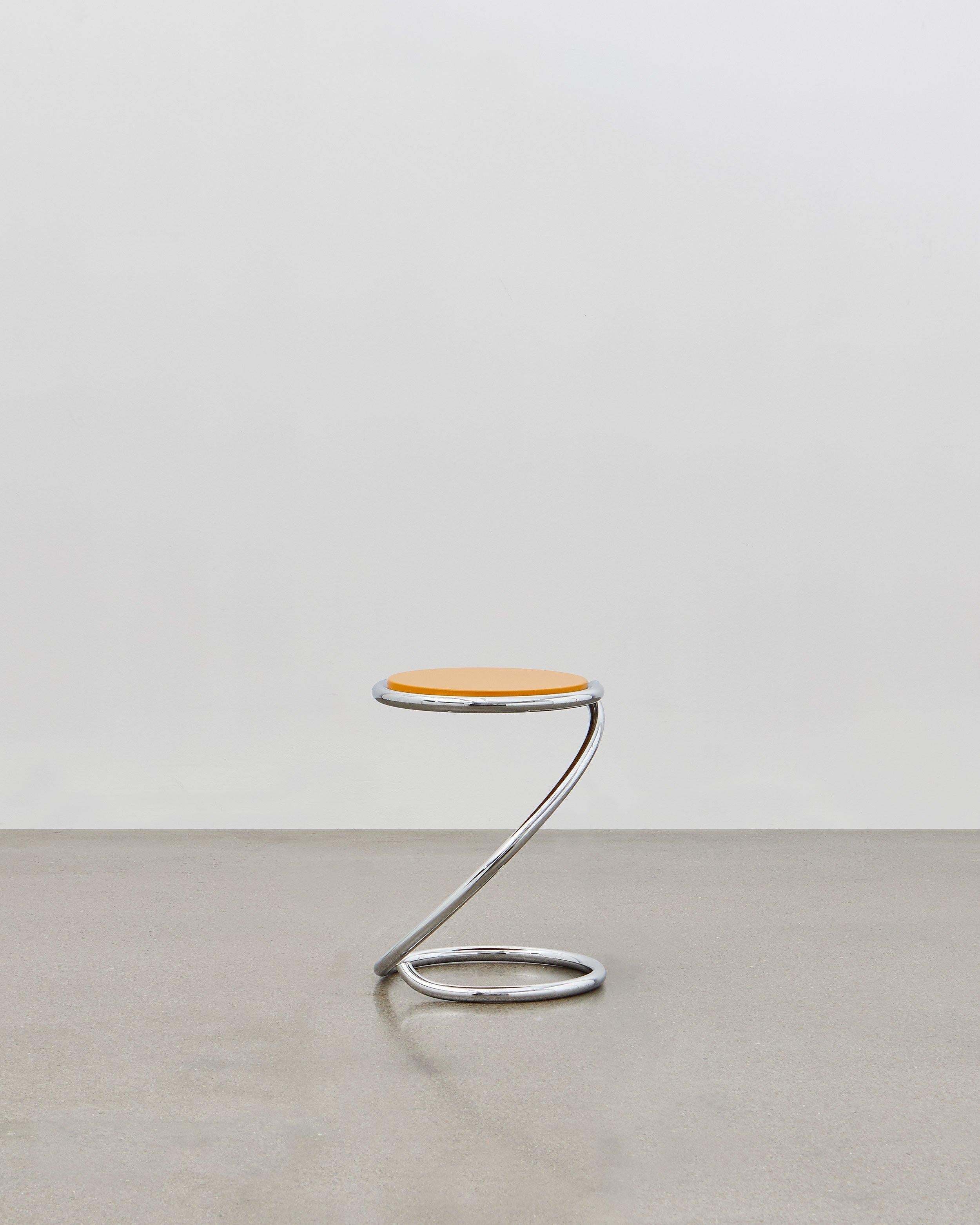 The PH Snake Stool is completely true to the original design and the use of chromed steel tubes, however updated for the 21st century to be available with wood seating in five colorways to coordinate with the ever-popular Poul Henningsen lighting