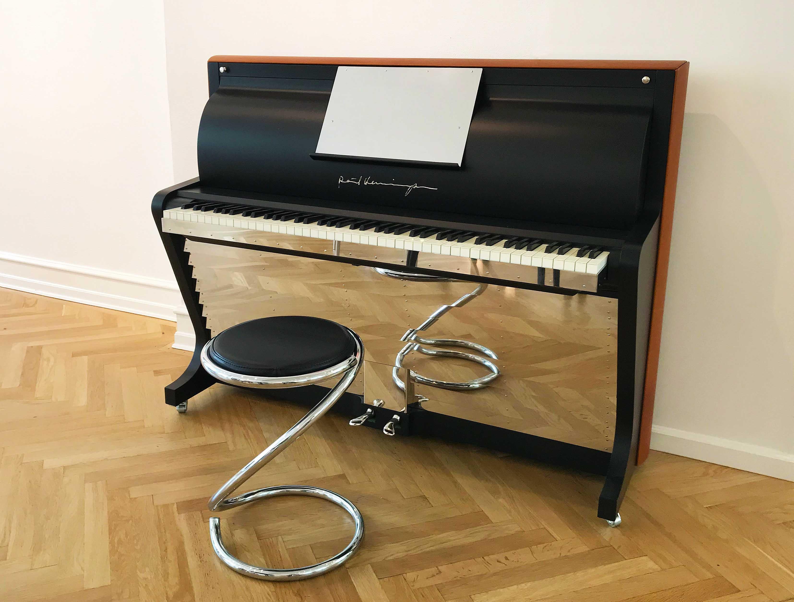 - All prices are listed ex works.
- 5 year guarantee.
- We regularly crate, ship and install PH Pianos worldwide with full insurance.

For those who want a traditional acoustic upright piano with one of the most iconic design silhouettes, the PH