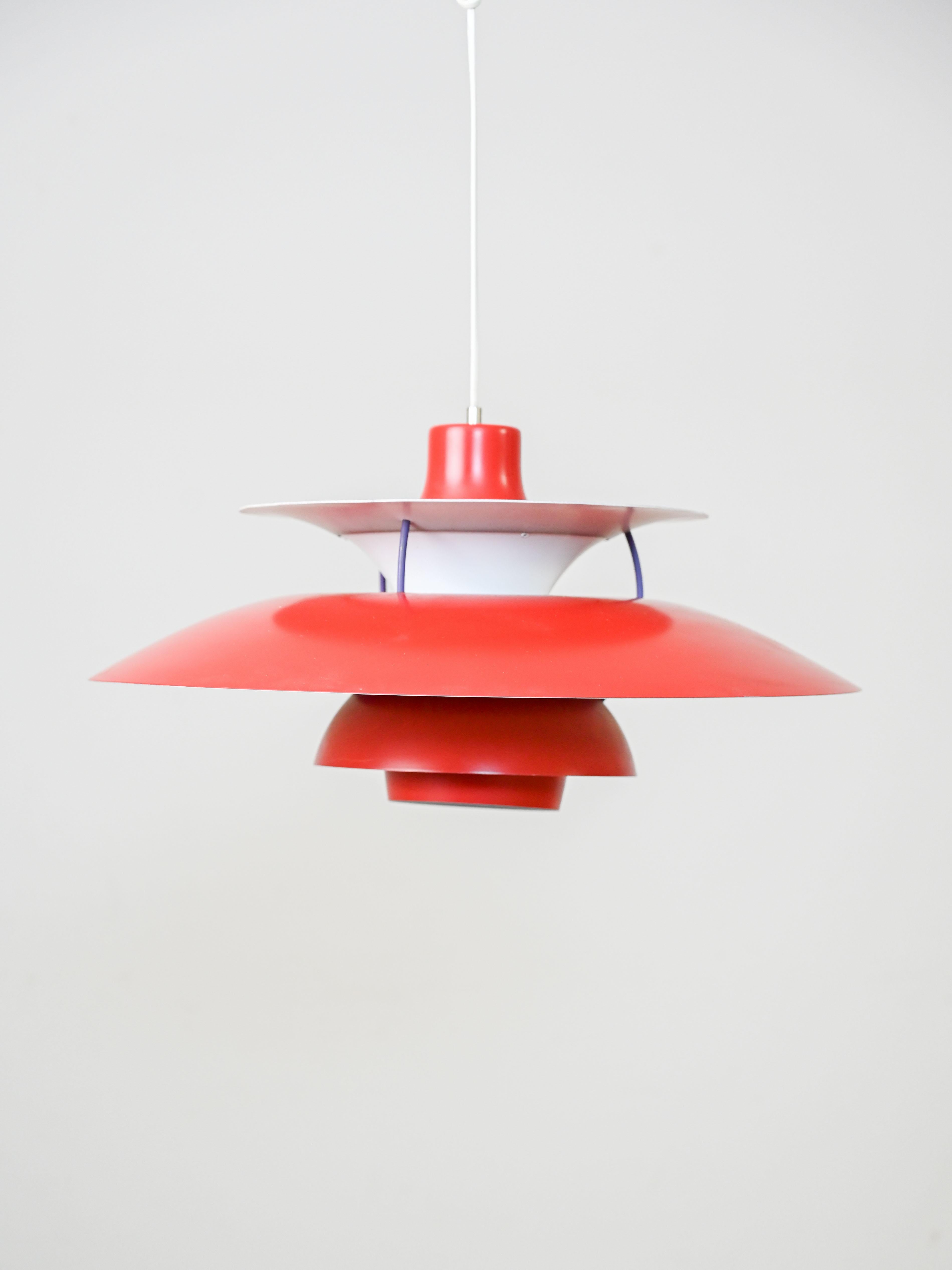 Suspension lamp model PH5, designed by Poul Henningsen for Louis Poulsen in 1958.

The innovative structure, consisting of several reflective lampshades joined together, makes it possible to recreate diffuse, anti-glare lighting.
The name PH5
