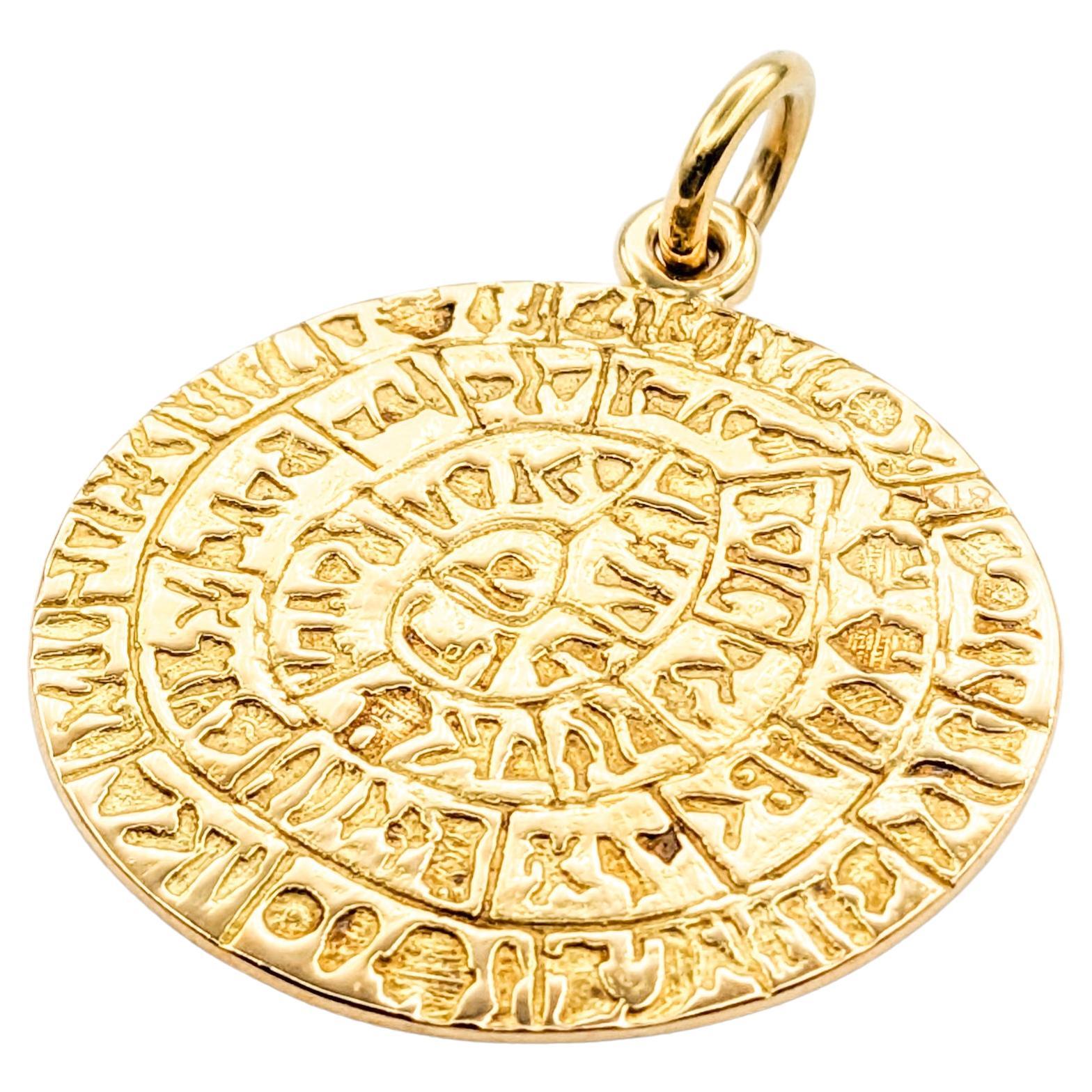 Phaistos Greek Disc Pendant In Yellow Gold For Sale