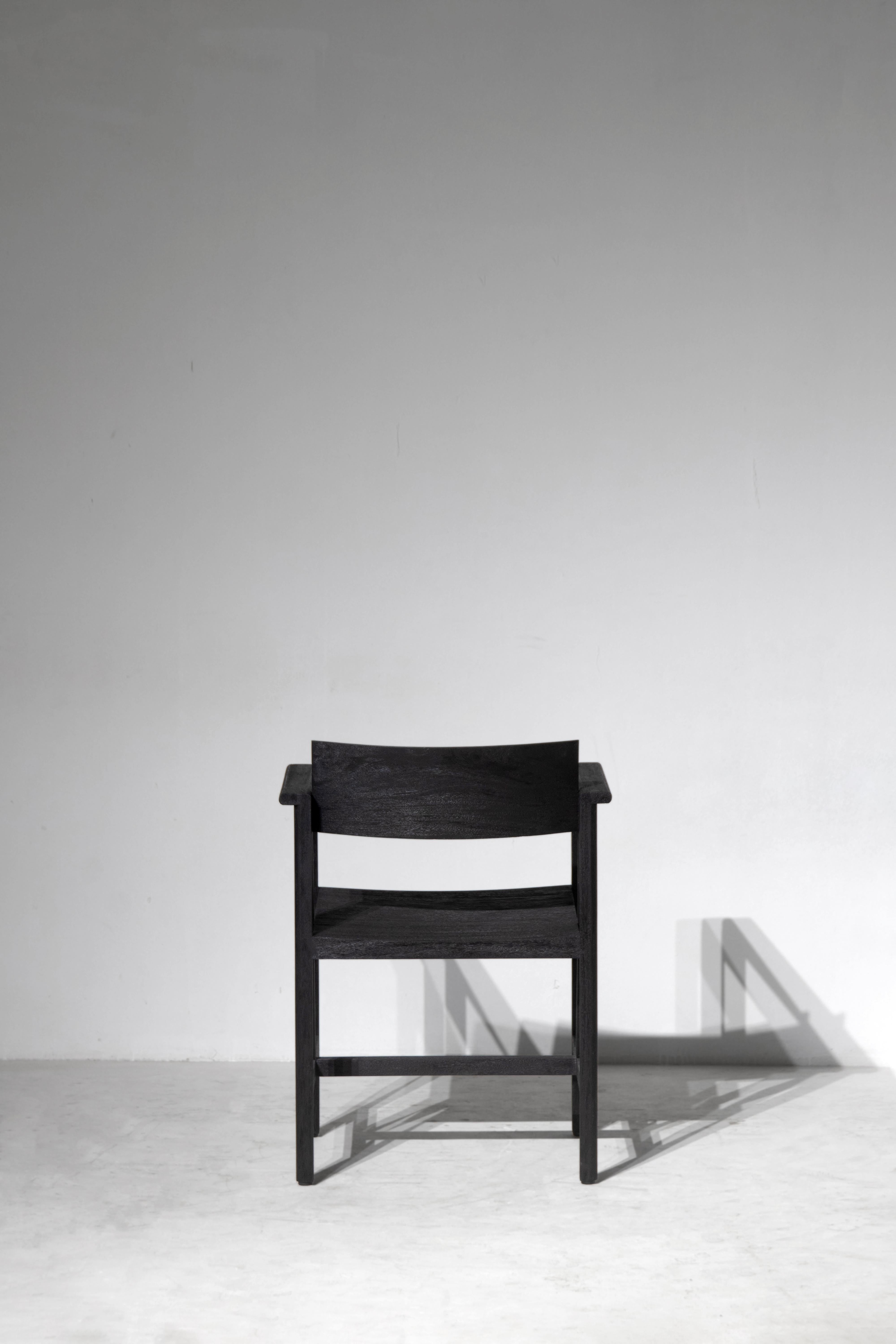 Hand-Crafted Phaka Chair, Rough Black Monkey Pod Wood For Sale