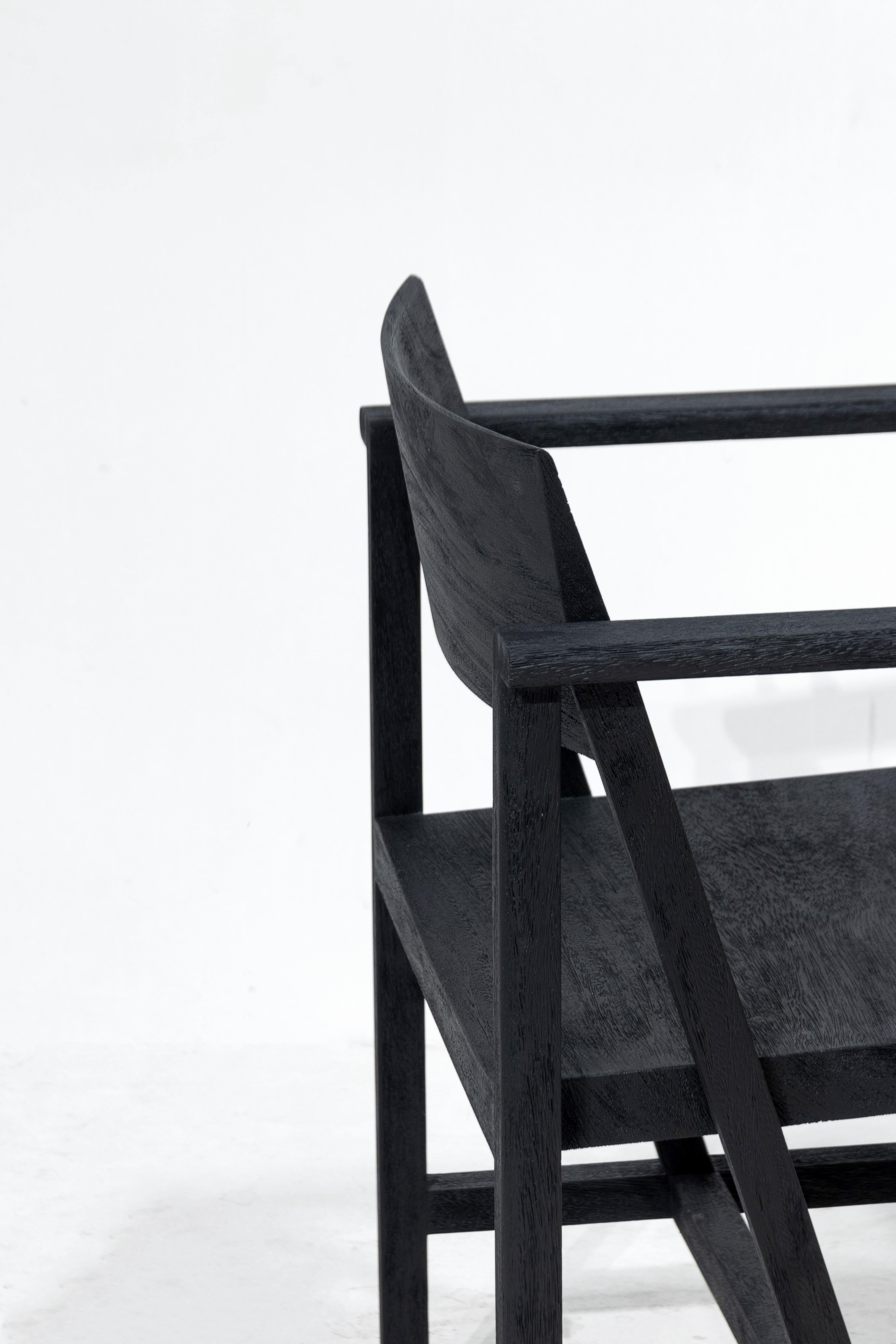 Contemporary Phaka Chair, Rough Black Monkey Pod Wood For Sale
