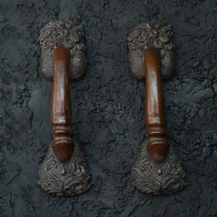 Phallus shaped bronze matched pair of cast door handles etched C. Kauna 1903