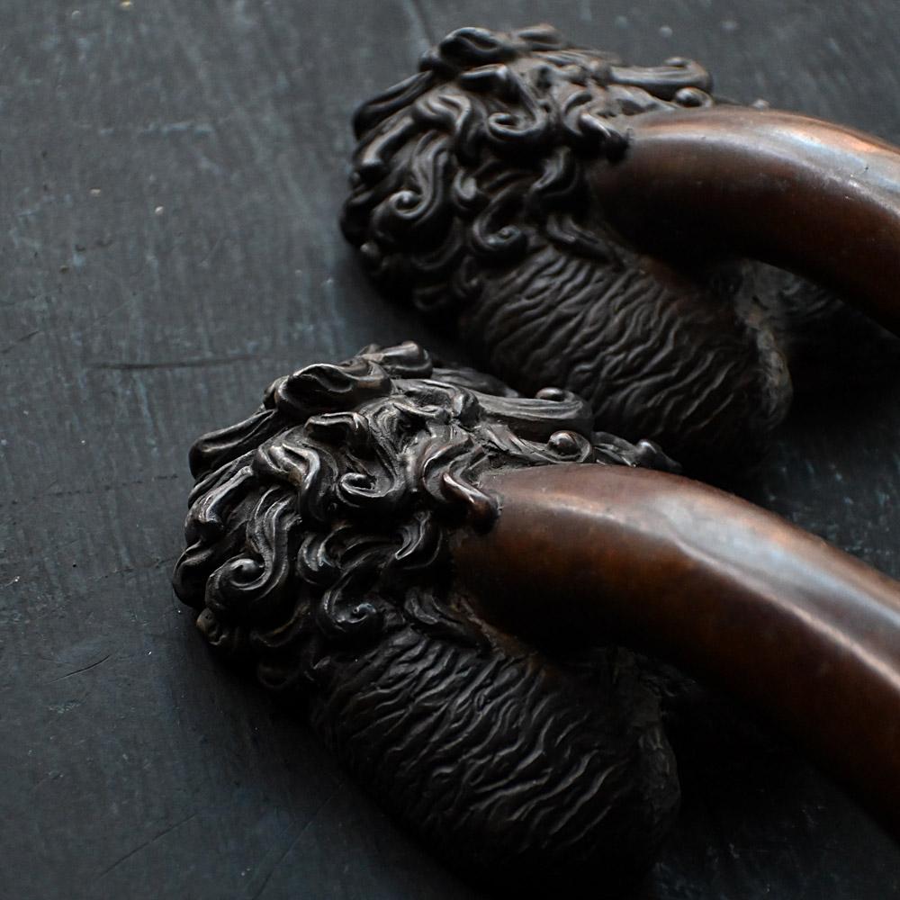Late Victorian Phallus shaped bronze matched pair of cast door handles etched C. Kauna 1903
