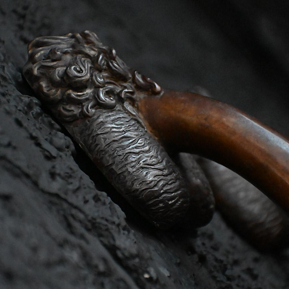 20th Century Phallus shaped bronze matched pair of cast door handles etched C. Kauna 1903