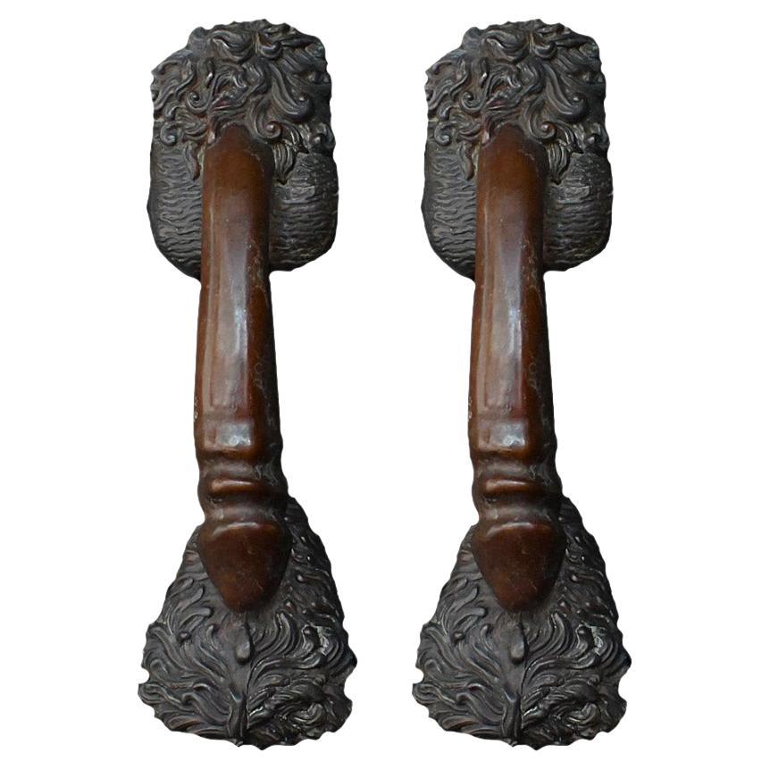 Phallus shaped bronze matched pair of cast door handles etched C. Kauna 1903