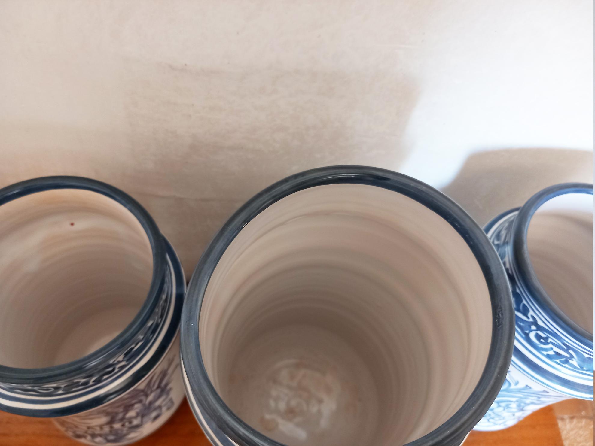      *The price is for one, but all 3 are sold together.

Three blue and white Spanish ceramic pharmacy jars. Lot

1 jar of 30x14x14 cm
2 jars of 25x13x13 cm

 Ceramic made in Spain. I don't know exactly where, I can't distinguish the signature, but