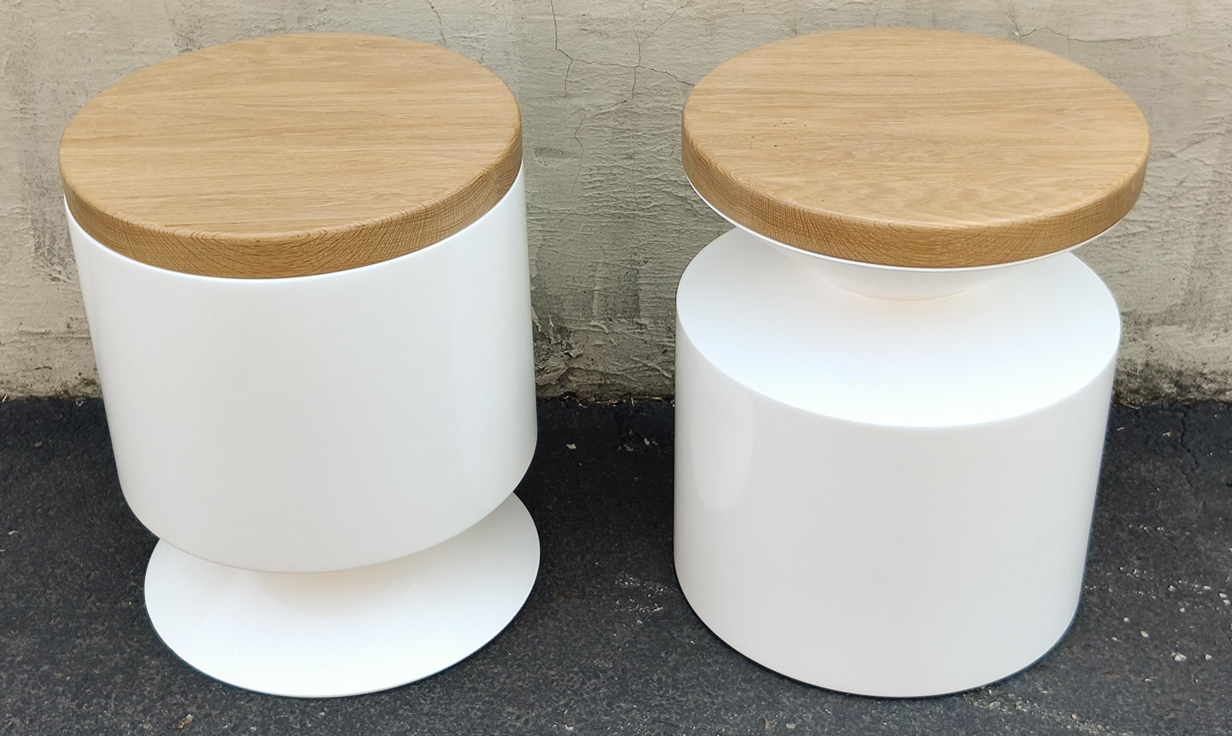 This versatile pair works interchangeably as side tables or stools. Made from a hand sanded fiberglass shell and finished with a high-end automotive polyurethane gloss finish, it is lightweight and durable. The 1.5
