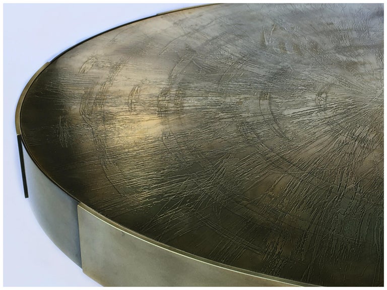 Phaux brass coffee table - Signed by Stefan Leo
Brass, etched, patinated 
Measures: D 120 circular, H 37cm
(Other dimensions, materials can be made to order)

Atelier Stefan Leo has a remarkable reputation thanks to its unique furniture designs