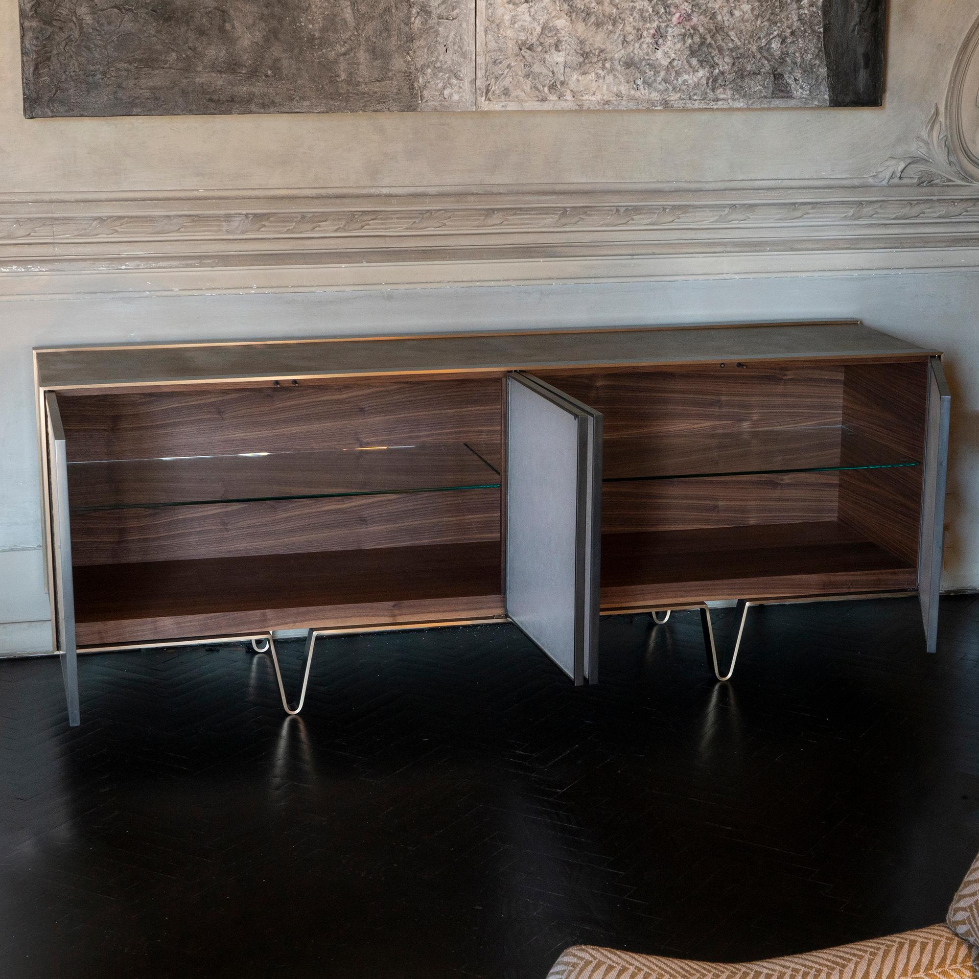One of a kind sideboard exclusively for Flair Florence by Atelier Stefan Leo, frame with its feet in bronze and four doors in a milkyway textured pate de verre, Top and sides in brass sculptural etched and the inside in solid walnut with two glass