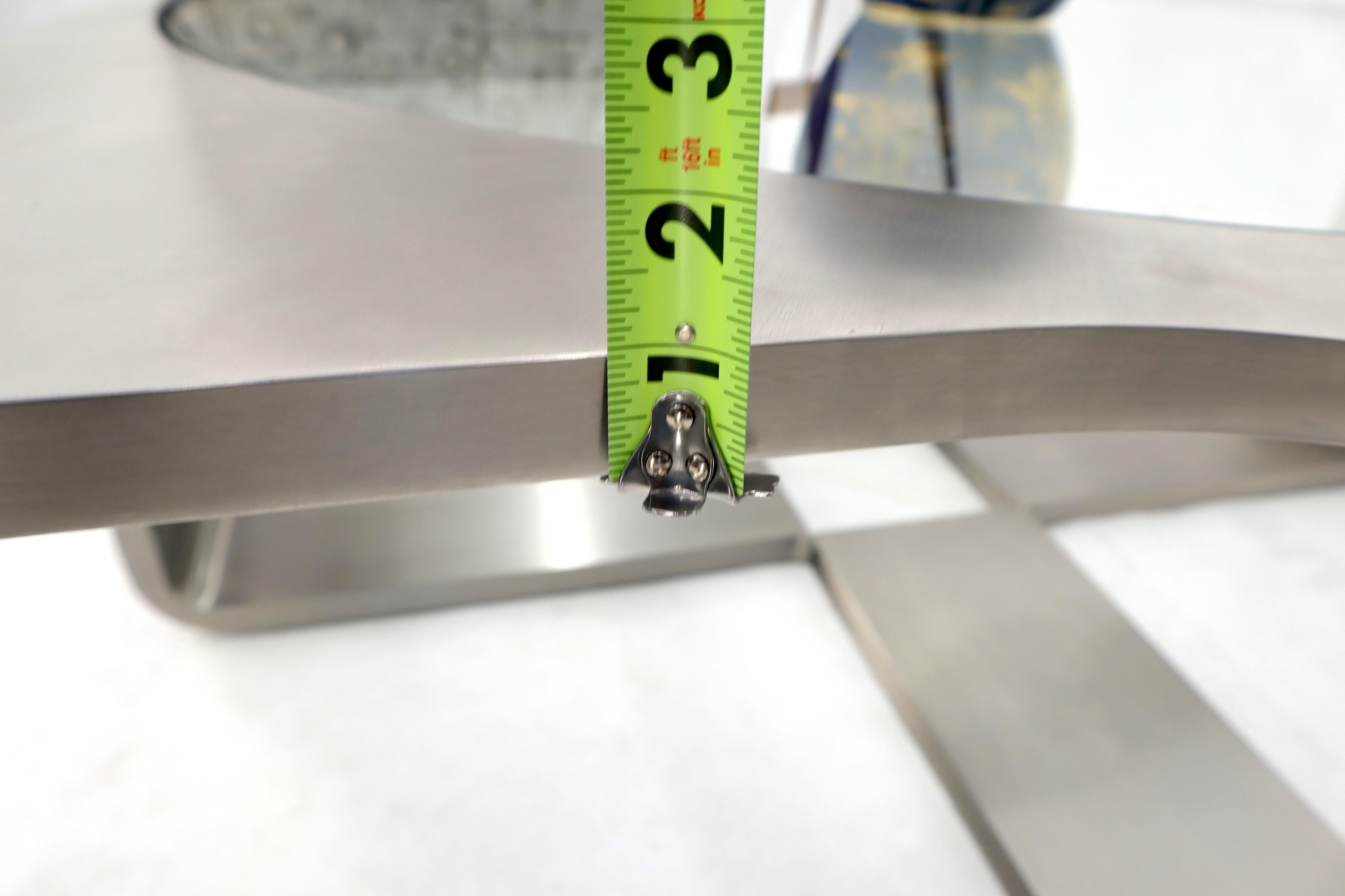 Phénoménale table à café carrée en acier inoxydable plié de 1