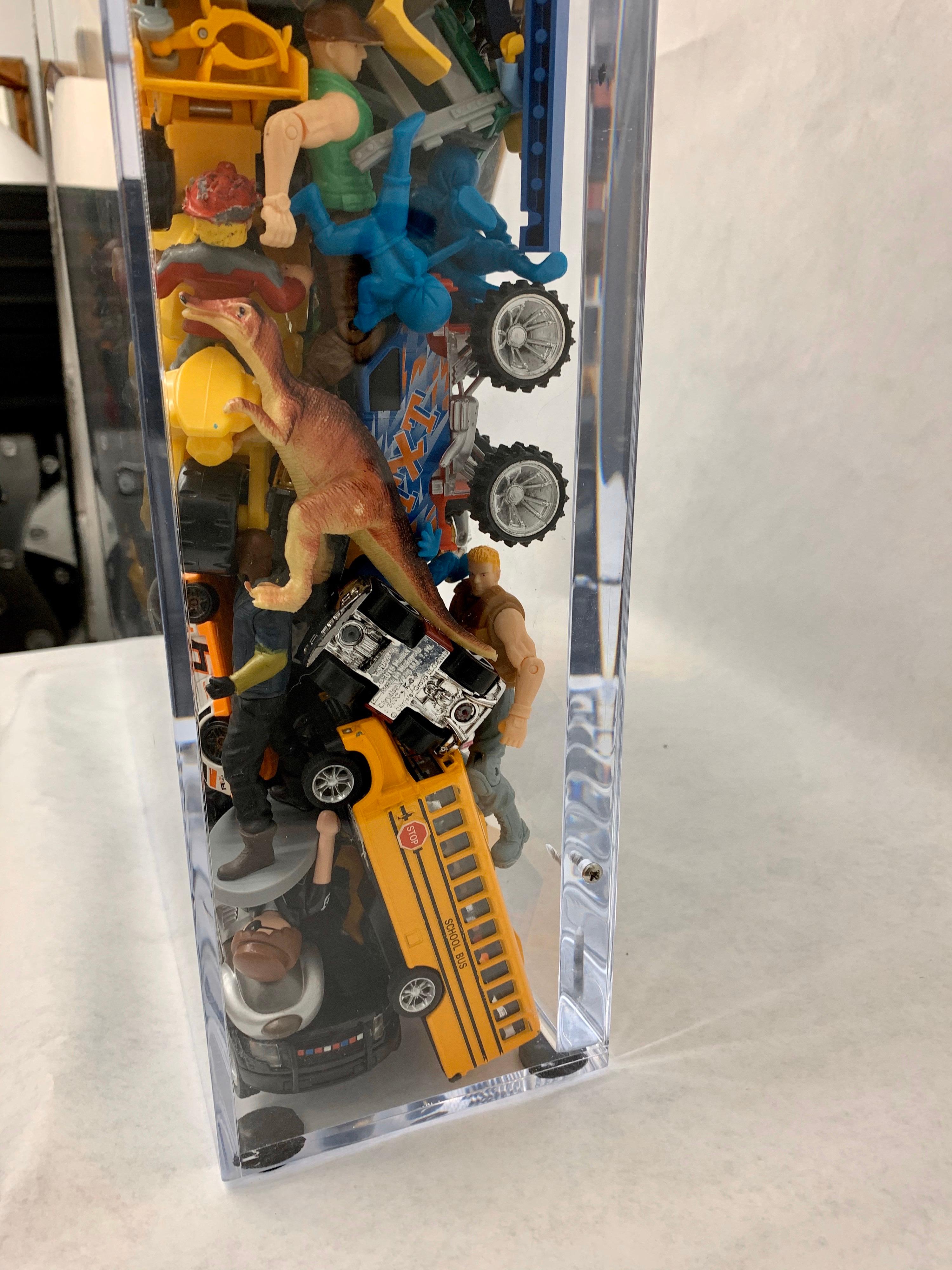 Phenomenal Collection of Toys Encased in a Lucite Box by J. Santamarina For Sale 3