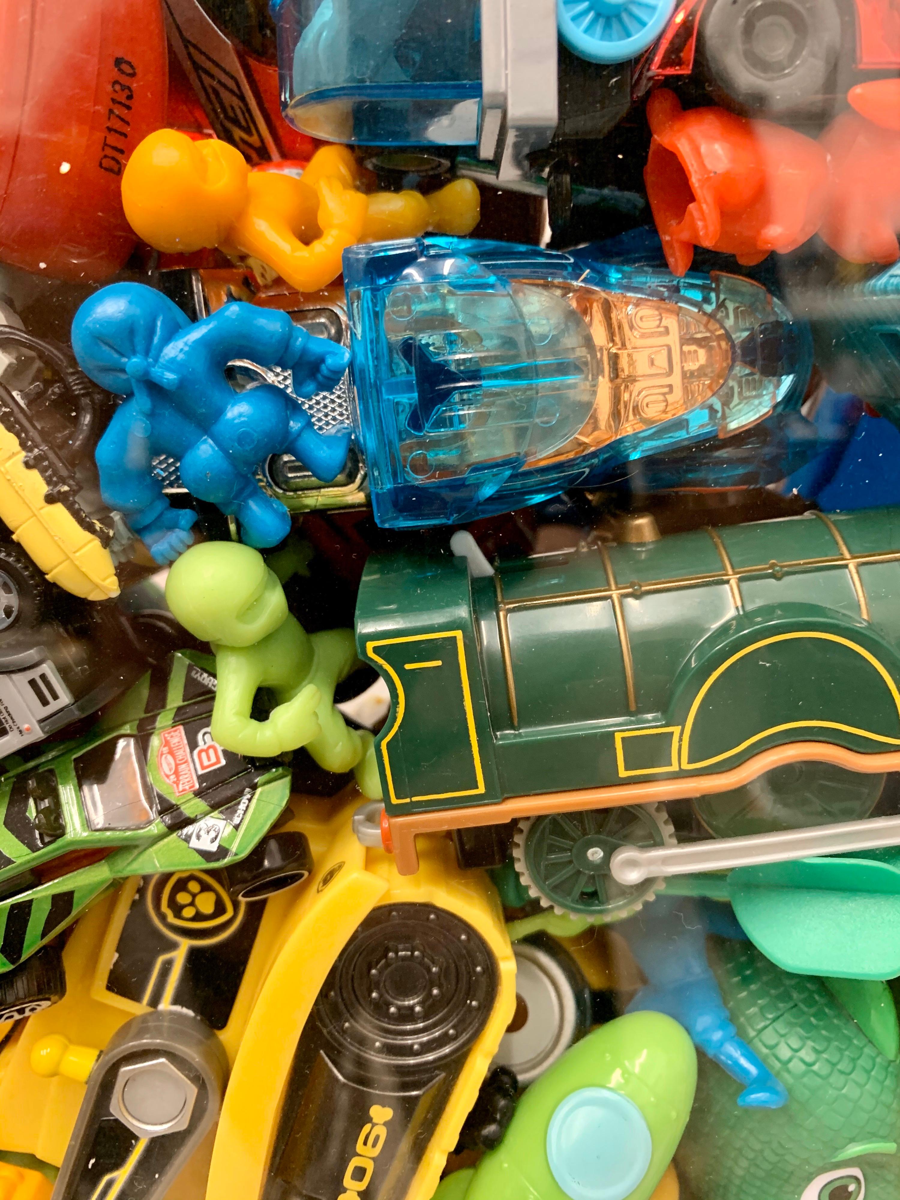 Phenomenal Collection of Toys Encased in a Lucite Box by J. Santamarina For Sale 5