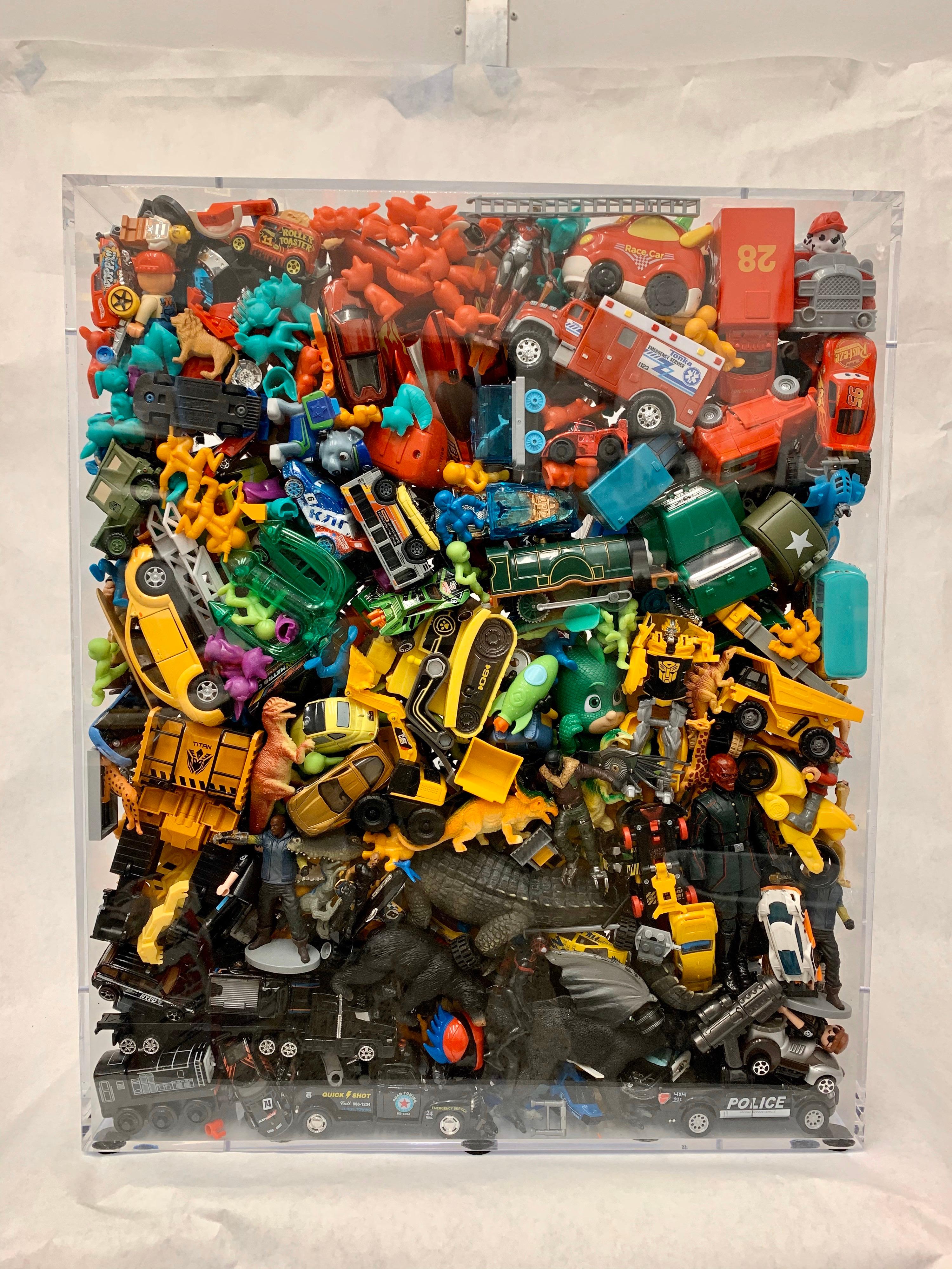 Phenomenal Collection of Toys Encased in a Lucite Box by J. Santamarina For Sale 7