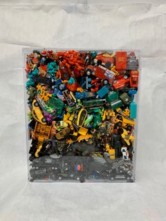 Phenomenal Collection of Toys Encased in a Lucite Box by J. Santamarina