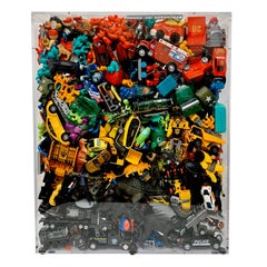 Phenomenal Collection of Toys Encased in a Lucite Box by J. Santamarina