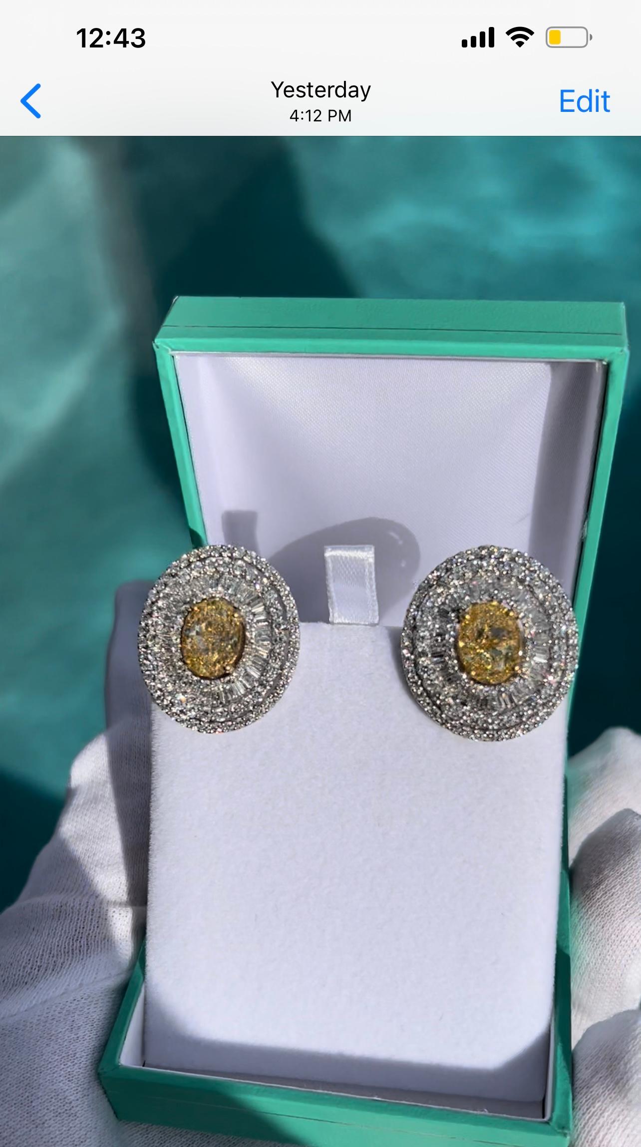 Artisan Phenomenal Pair of 17.39 Carat Fancy Yellow and White Diamond Earrings 18K Gold