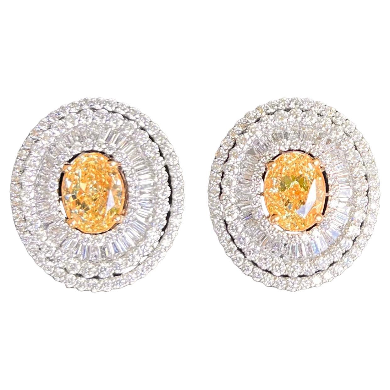 Phenomenal Pair of 17.39 Carat Fancy Yellow and White Diamond Earrings 18K Gold