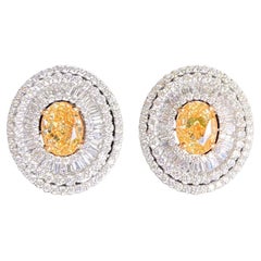 Phenomenal Pair of 17.39 Carat Fancy Yellow and White Diamond Earrings 18K Gold