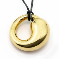 Phenomenal Tiffany & Co. Elsa Peretti Eternal Circle 18 Karat YG Pendant on Cord